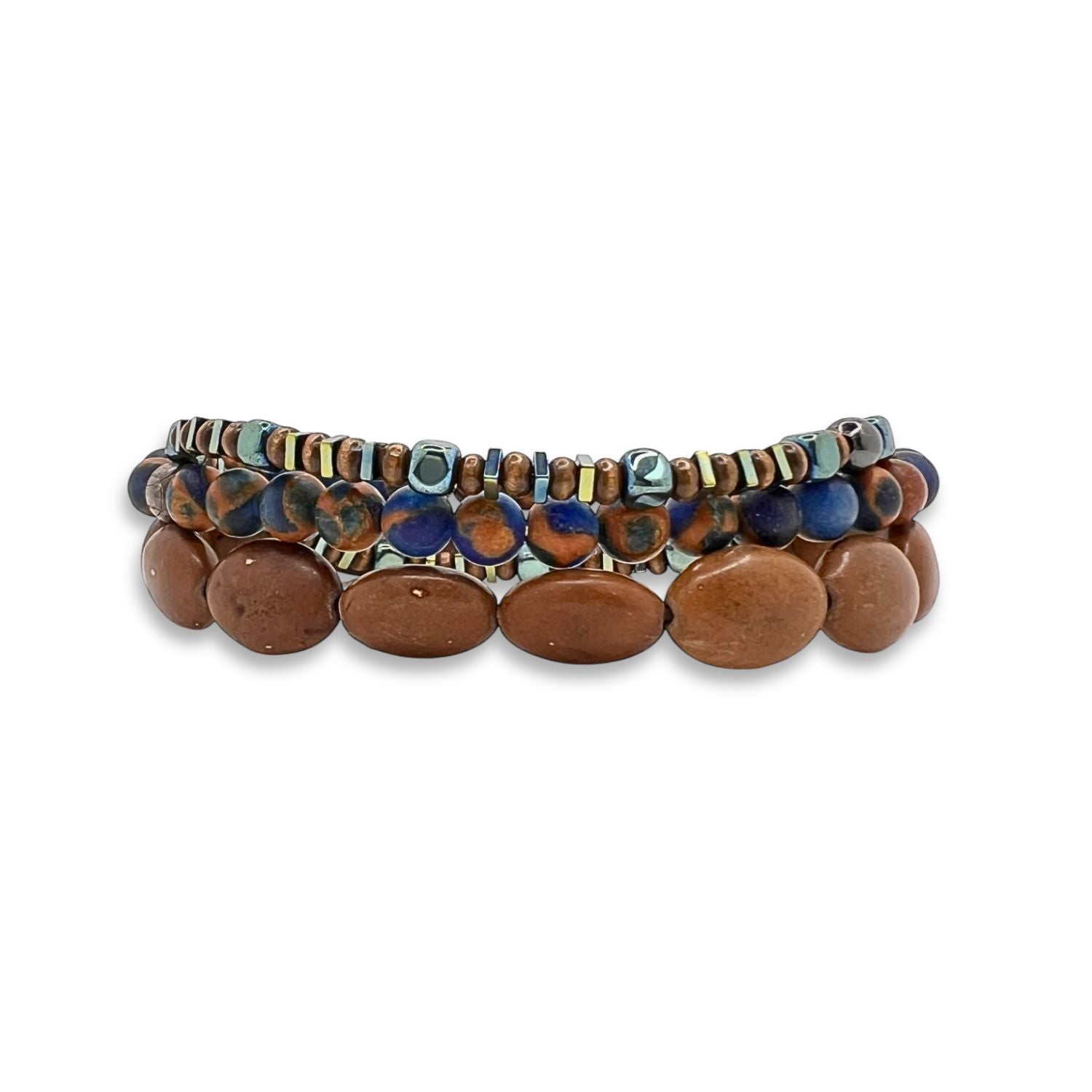 The Coffee King Bracelet Set by JAREDJAMIN Jewelry Online features three wrap-around bracelets: one with large smooth brown beads, one with marbled blue and tan jasper, and one with green, silver, hematite, and striped beads—tied with a leather loop.