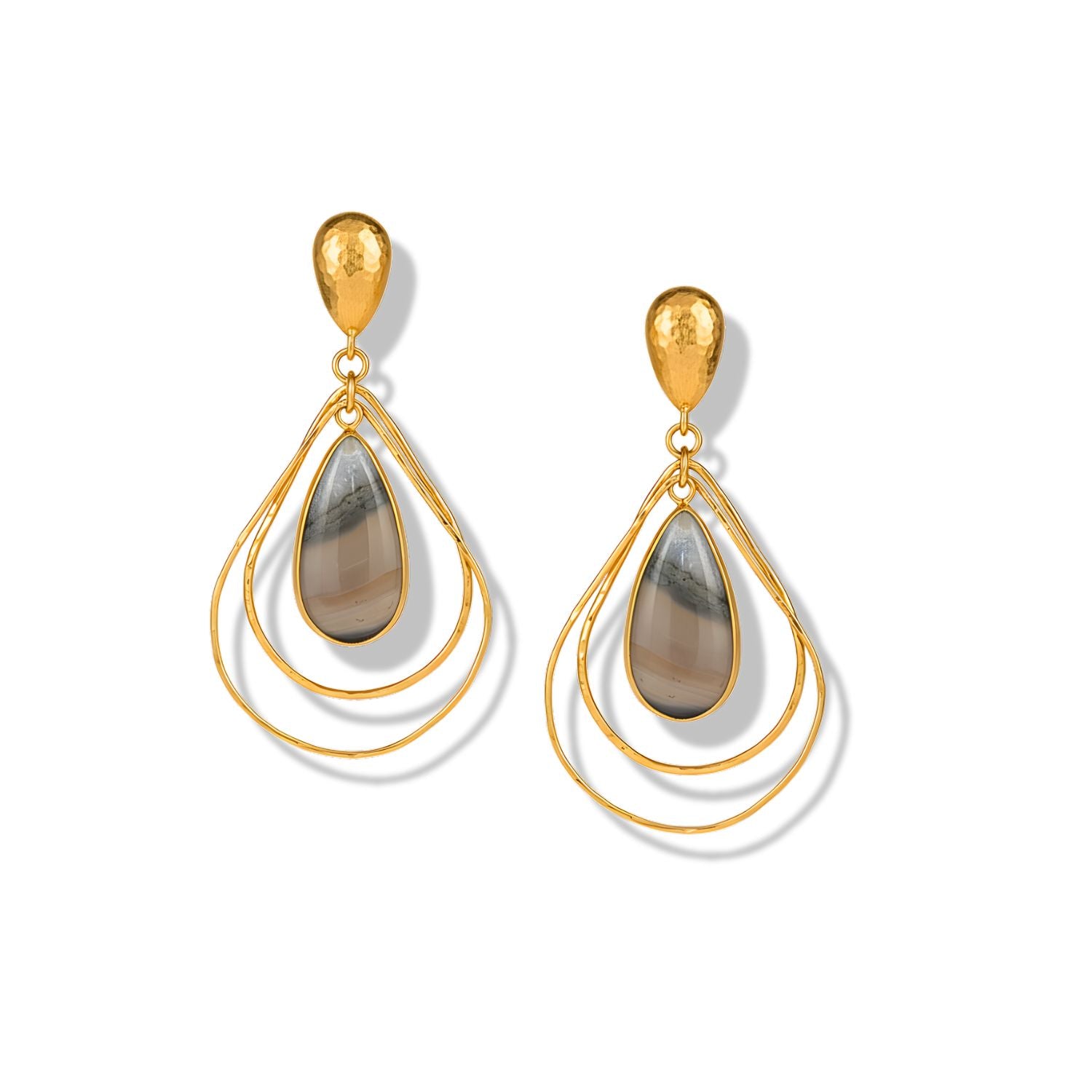 The Darlena Gold Agate Drop Earrings by JAREDJAMIN Jewelry Online feature hammered teardrop studs, three overlapping gold hoops, and a central brown and gray striped agate pendant. Displayed on a white background with a subtle shadow.