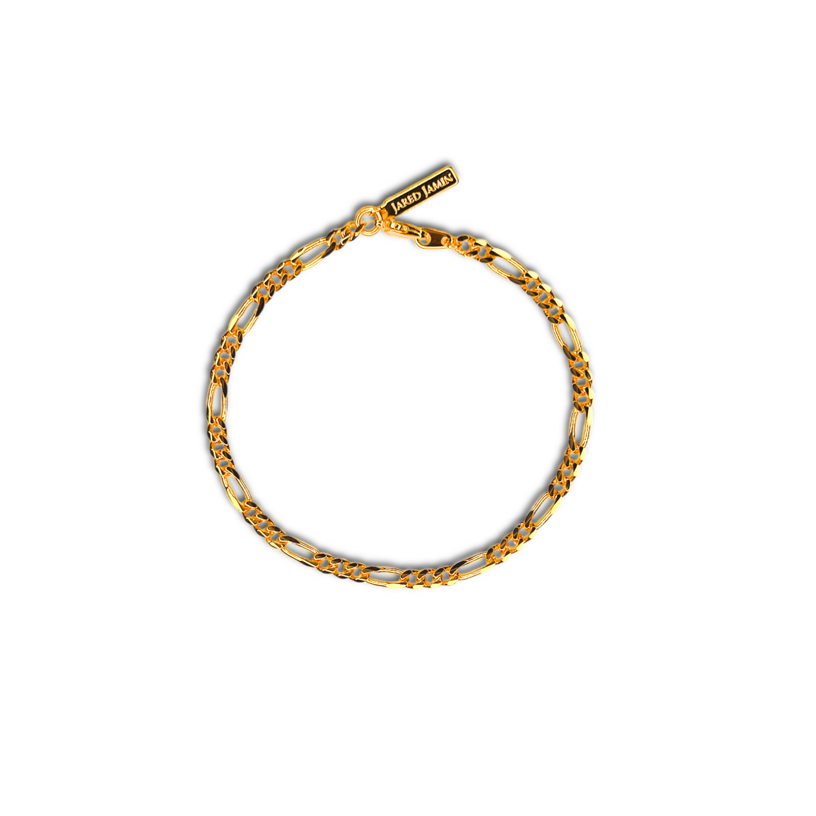 The Gold Finley-Figaro Chain Bracelet by JAREDJAMIN Jewelry Online features delicate interlocking 18K gold plated links, a JARED JAMES engraved tag, and a secure lobster clasp, shown on a white background.