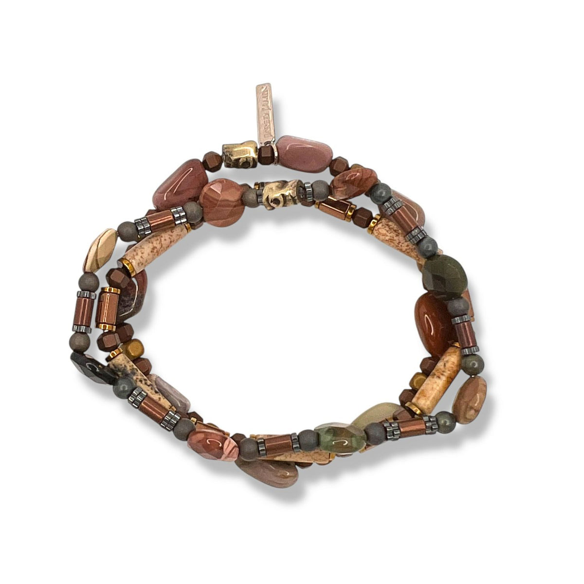 The Forest Floor Bracelet Set by JAREDJAMIN Jewelry Online features coiled strands of fancy jasper and barrel-shaped beads with matte hematite accents in earthy brown, tan, red, and green for a woodland-inspired look.