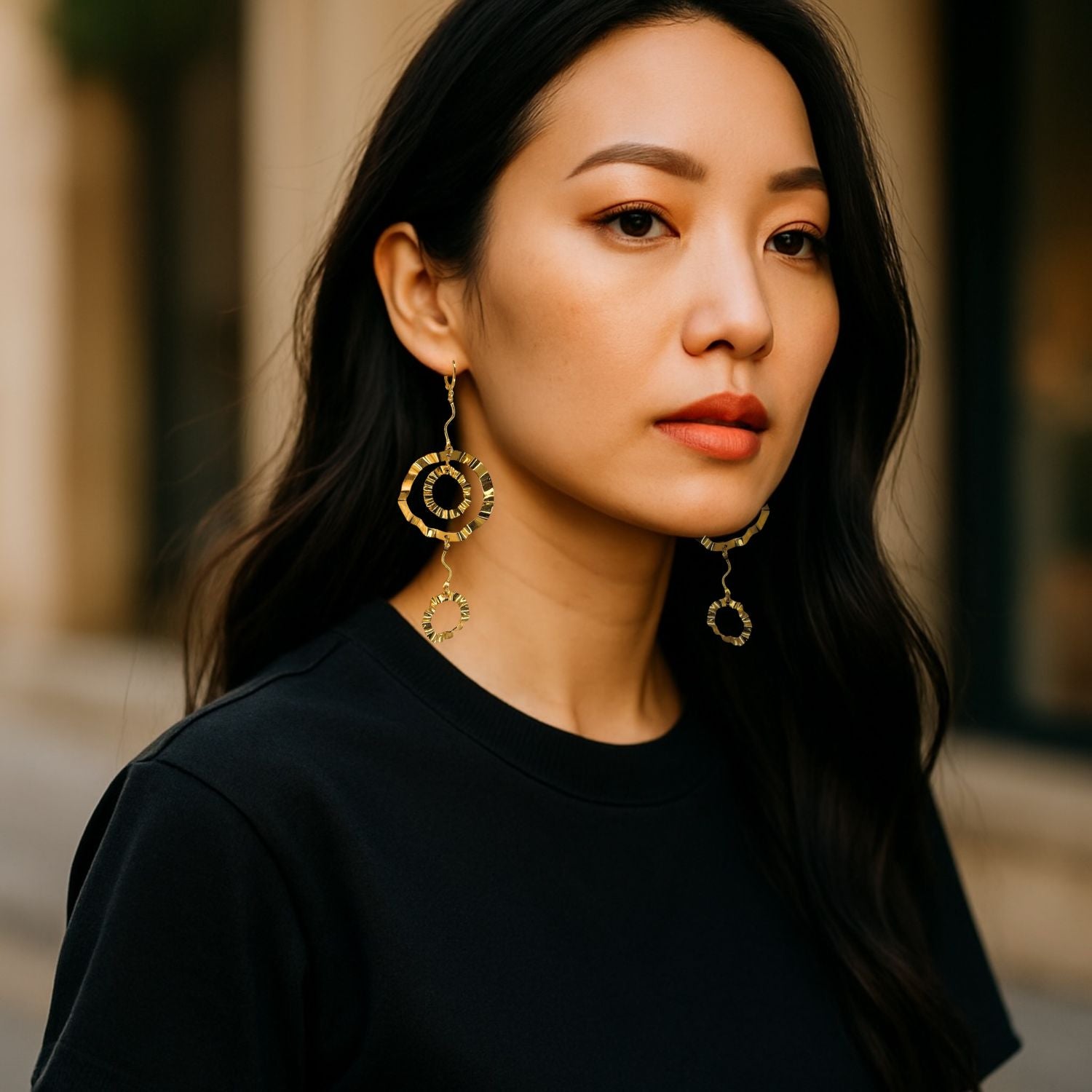 The Gold French Ruffle Leverback Earrings by JAREDJAMIN Jewelry Online feature three textured, interlocking open circles in 18K gold plating, connected by wavy gold wires and secured with leverback fastenings.