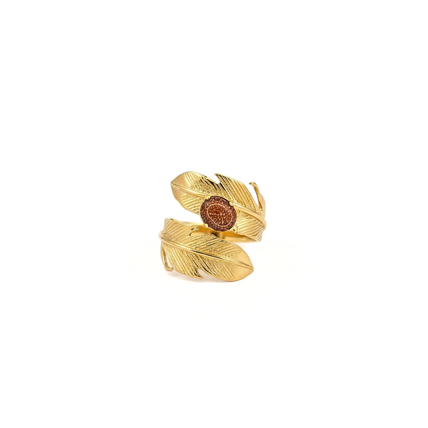 The Gold Plume Adjustable Ring by JAREDJAMIN Jewelry Online features two overlapping feather motifs in 18k gold plating, with fine etchings and a central round gemstone cabochon set in a raised bezel, all on a plain white background.