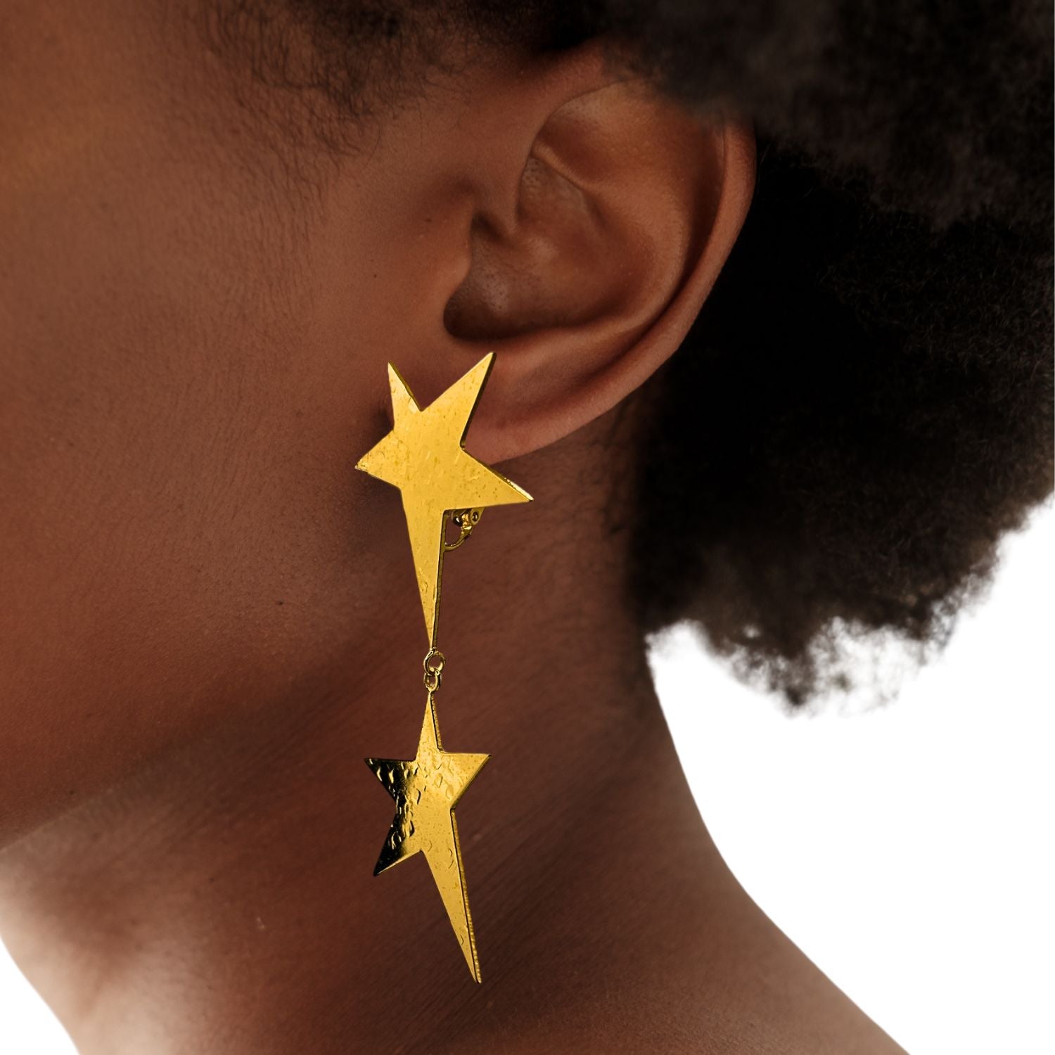 Gold Shooting Star Dangle Clip On Earrings by JAREDJAMIN Jewelry Online feature two textured, five-pointed stars linked together in 18K gold with hammered shine and clip-on backs for easy wear.