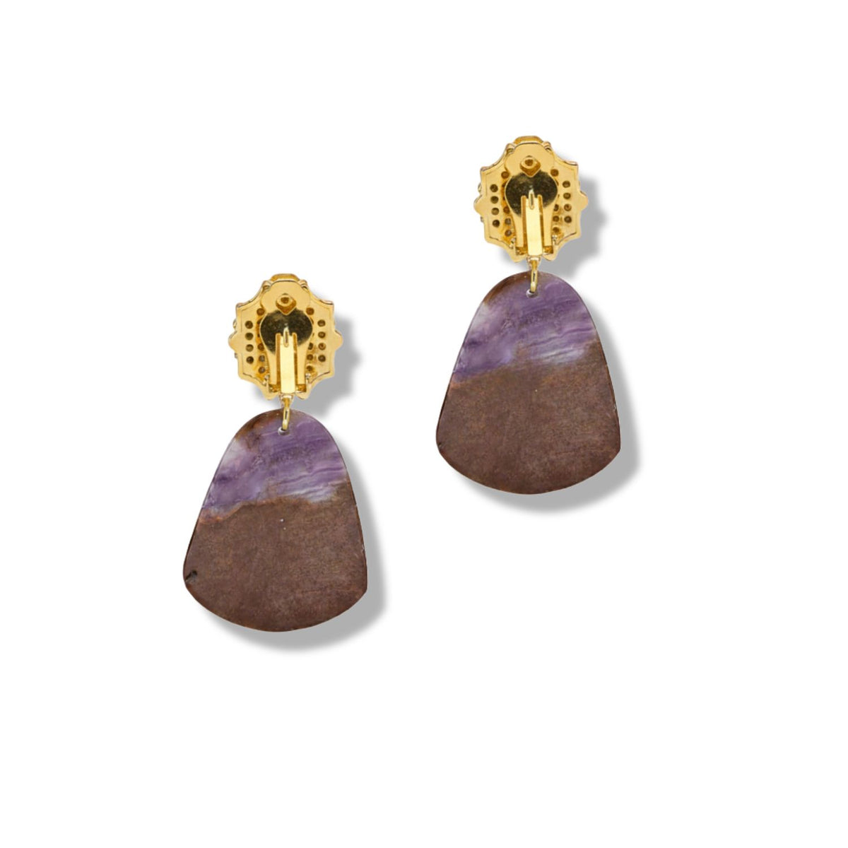 The Honeycomb Clip on Earrings with Jasper by JAREDJAMIN Jewelry Online feature irregular triangular purple and brown jasper pendants on gold-toned, textured clip-ons, displayed against a plain white background to highlight their unique design.