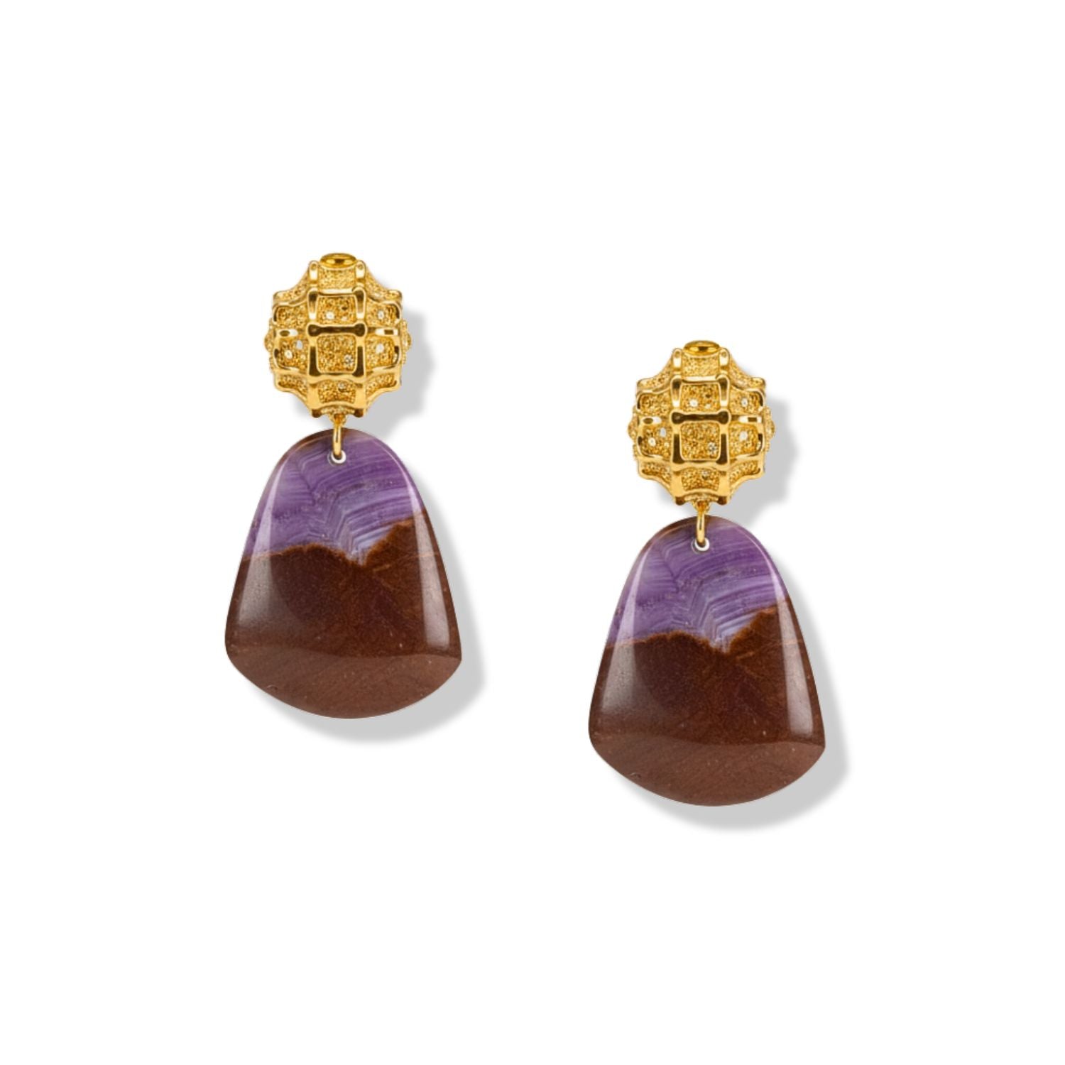 The Honeycomb Clip On Earrings from JAREDJAMIN Jewelry Online feature ornate 18k gold plating and a filigree design, each showcasing a brown-to-purple jasper teardrop pendant set against a white background.
