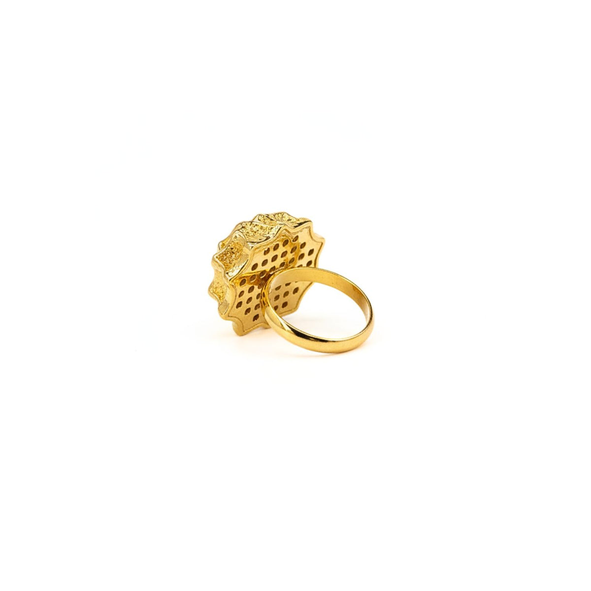 The Honeycomb Ring by JAREDJAMIN Jewelry Online features an ornate, flower-shaped, gold setting with a lacy perforated pattern and polished finish, resembling a geometric dome, shown band-forward against a white background.