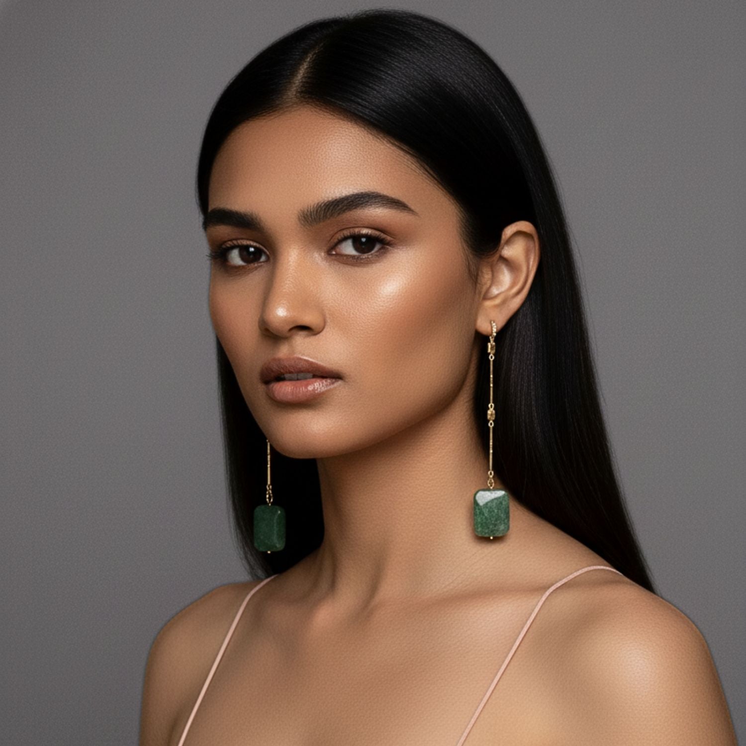 The Lattice of Gladys Aventurine Drop Earrings by JAREDJAMIN Jewelry Online feature long 18K gold-plated bars with geometric details and rectangular green gemstone pendants, shown against a white background.