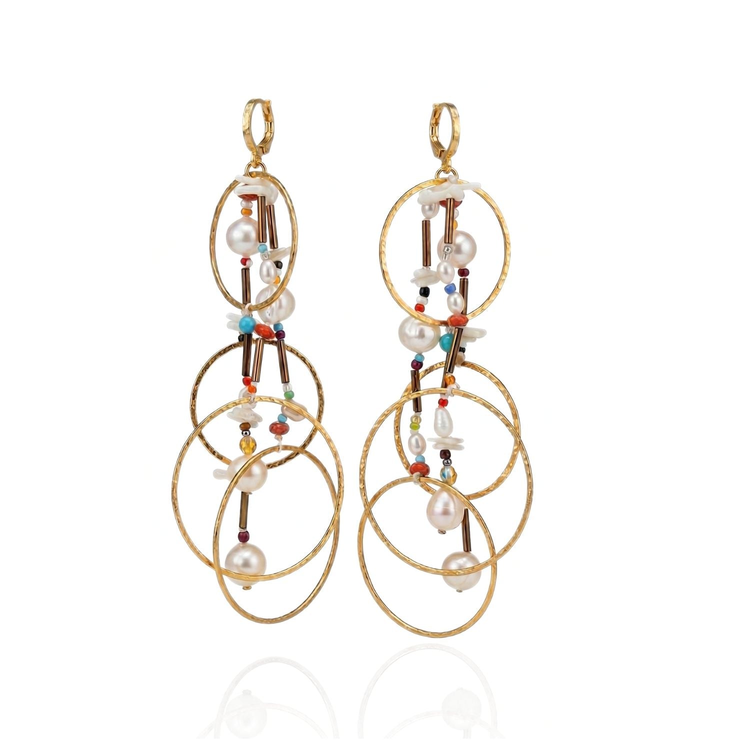 The Lindy Dream Catcher Dangle Earrings by JAREDJAMIN Jewelry Online feature three interlocking gold hoops per earring, adorned with colorful beads, pearls, and delicate gold rods for an elegant bohemian look.