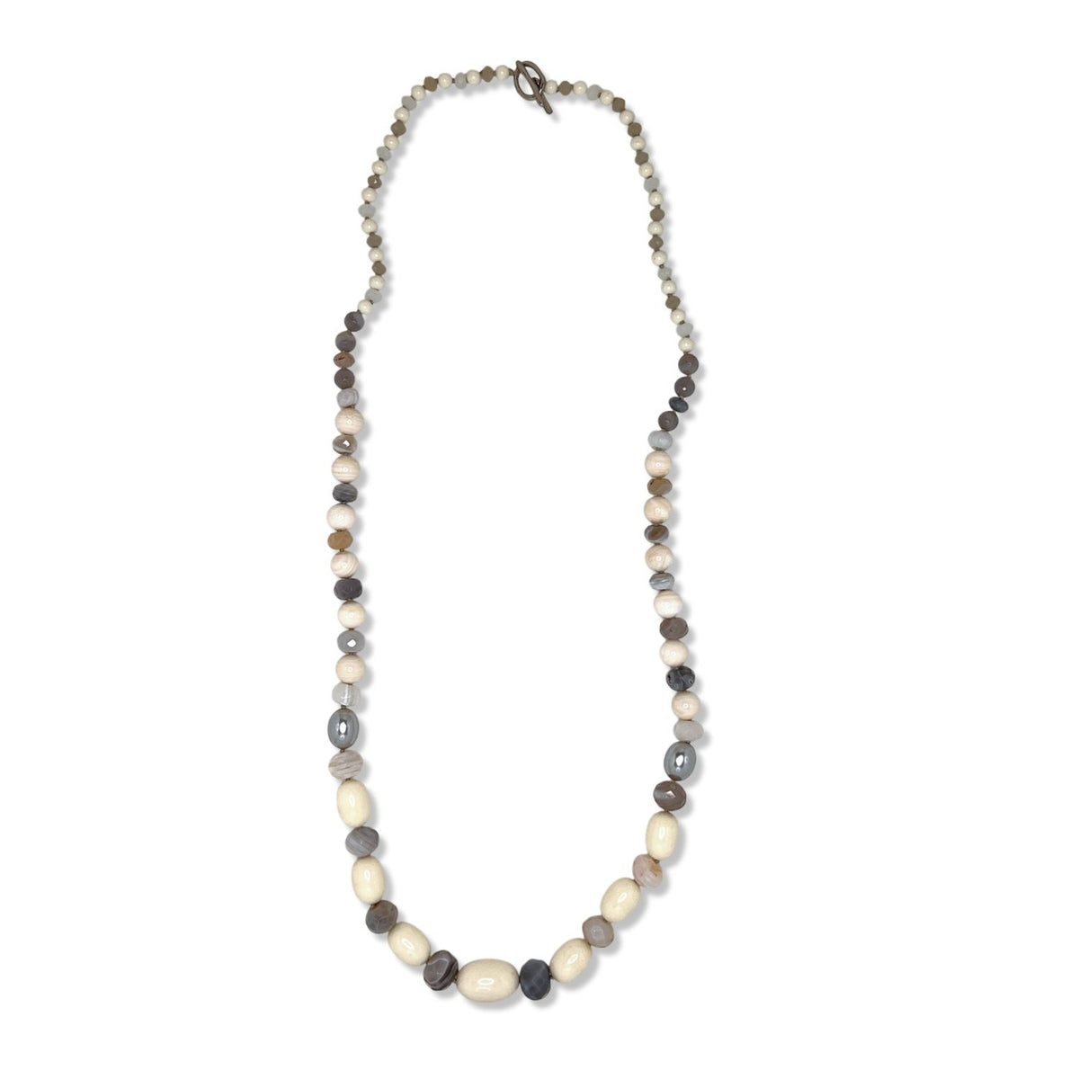 The Montana Quarry Necklace by JAREDJAMIN Jewelry Online features vintage lucite beads in alternating cream, gray, and brown round and oval shapes, arranged symmetrically with a small clasp, displayed on a white background.