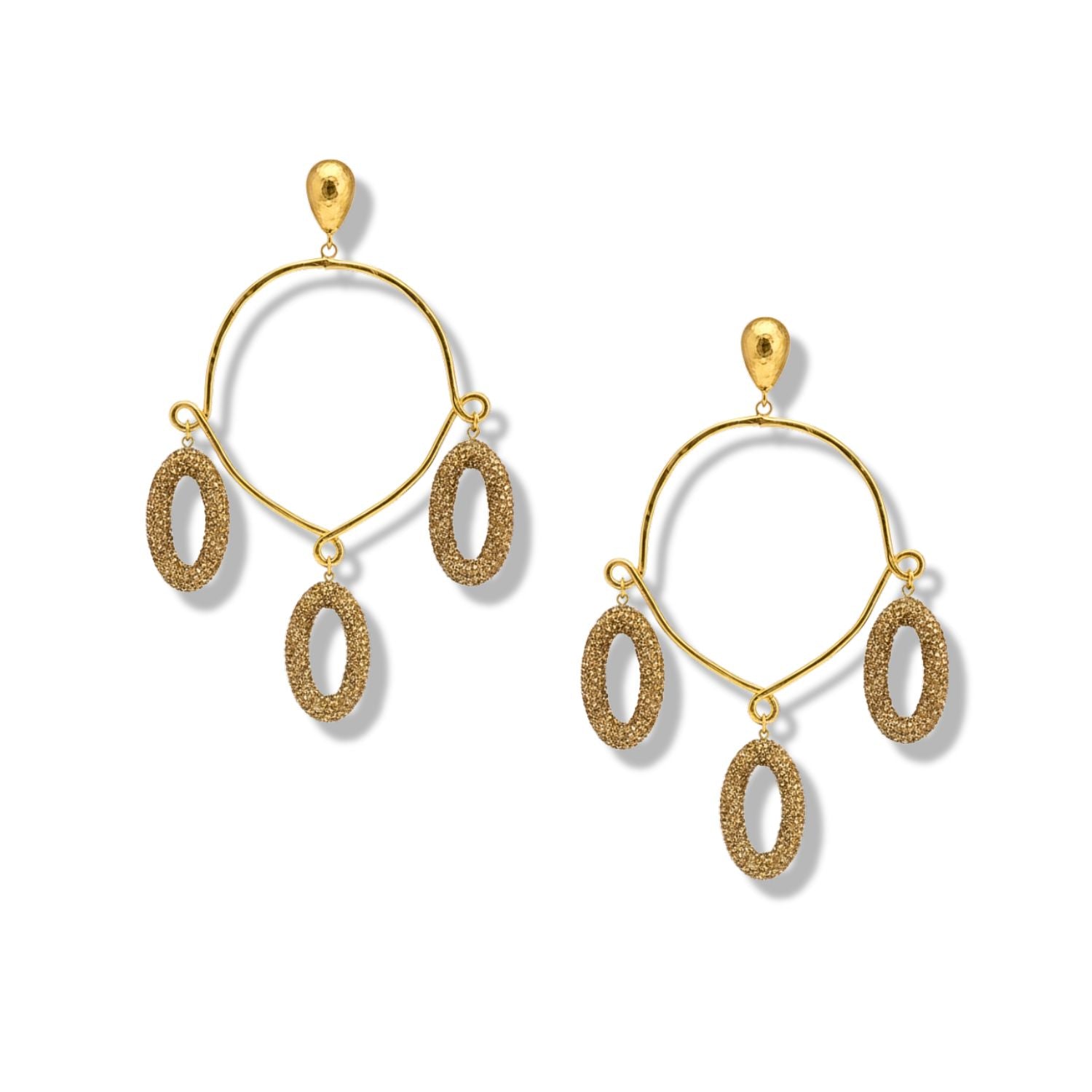 The Seraphina Chandelier Post Earrings by JAREDJAMIN Jewelry Online feature 18k gold-tone metal, teardrop-shaped studs, open hoops, and three textured oval dangles each—statement jewelry shown against a plain white background.
