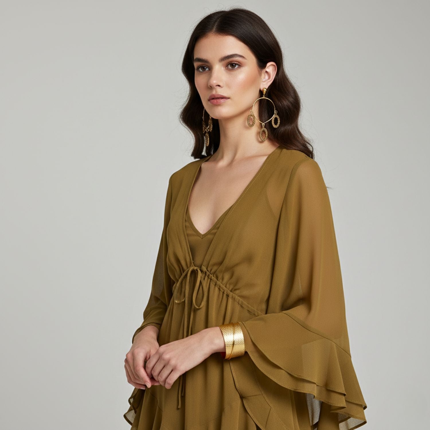 The Seraphina Chandelier Post Earrings by JAREDJAMIN Jewelry Online feature 18k gold-tone metal, teardrop-shaped studs, open hoops, and three textured oval dangles each—statement jewelry shown against a plain white background.