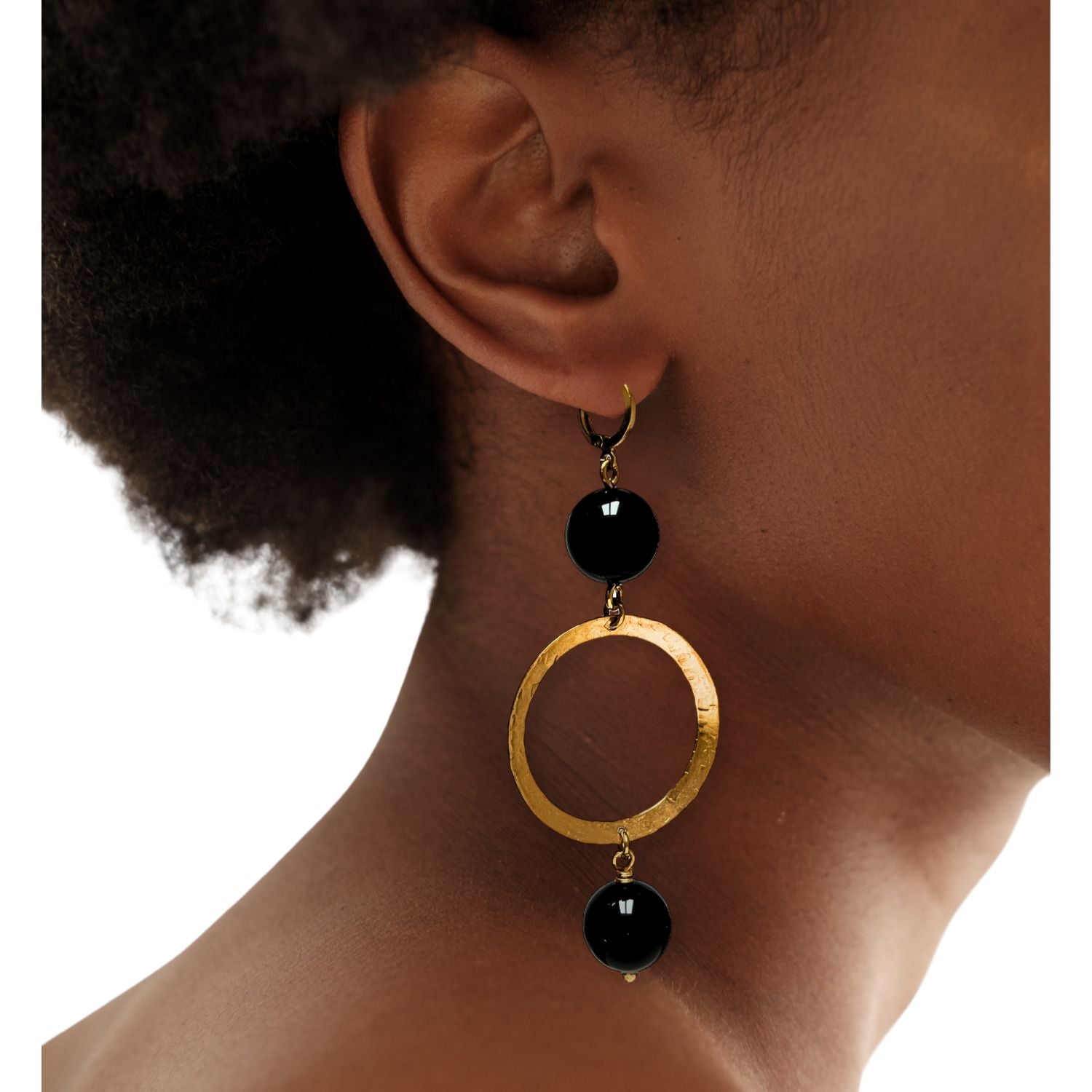 The Ursula Gold Onyx Earrings by JAREDJAMIN Jewelry Online feature 18K gold hammered hoops with glossy black beads, gold hooks, and a modern, hypoallergenic design—perfect for sensitive ears.