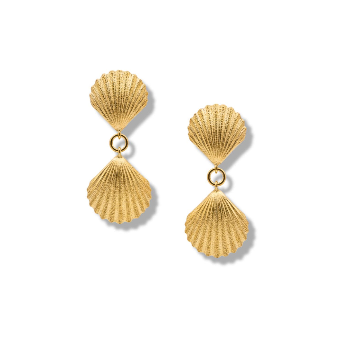 The Gold Venus Clip On Earrings by JAREDJAMIN Jewelry Online feature two textured, gold scallop shells connected by a small ring for a dangle effect—perfect resort-ready shell-inspired jewelry.