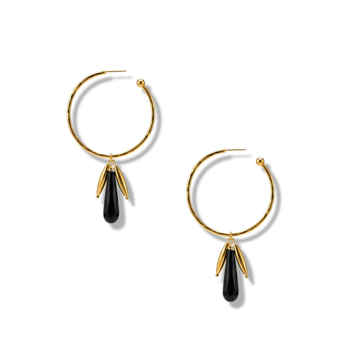 The Small Hooptastic Wisteria Charm Gold Hoop Earrings by JAREDJAMIN Jewelry Online feature gold hoops with black teardrop pendants and two gold leaf accents, shown on a white background.