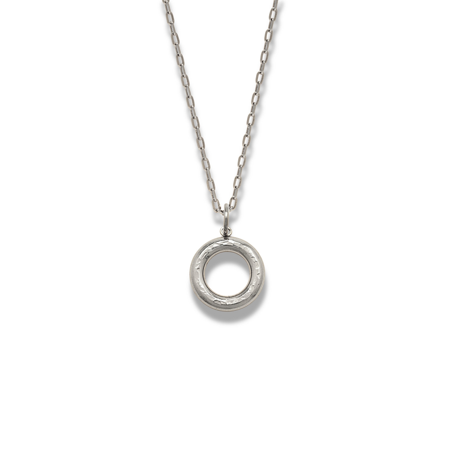 The Gold Hammered Doughnut Pendant Necklace by JAREDJAMIN Jewelry Online features a fine gold chain and a polished 18k hammered doughnut pendant, shown centrally on a white background with the necklace casting a soft shadow rightward.