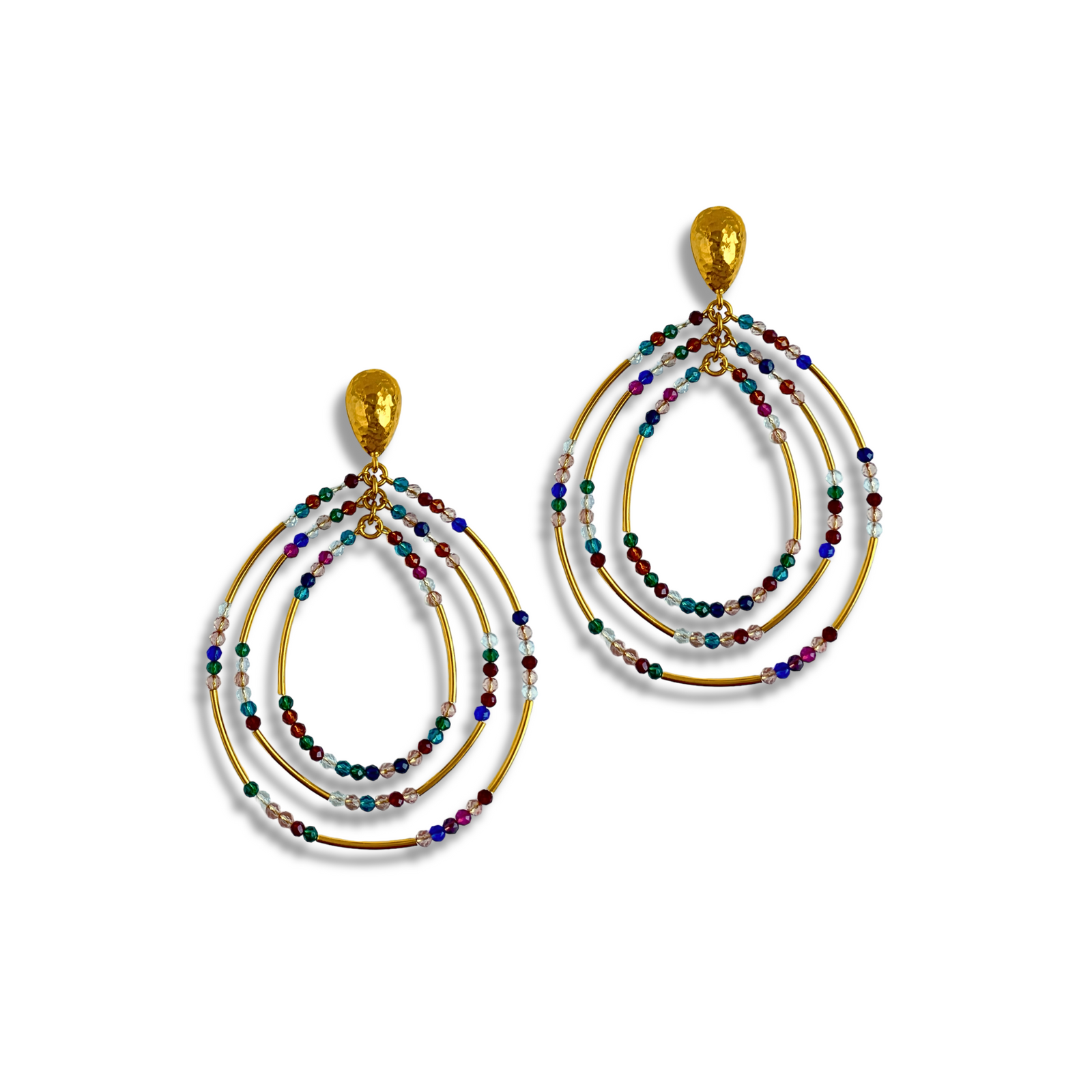 The Easy Breezy Multicolor Post Earrings from JAREDJAMIN Jewelry Online feature gold-plated dangle earrings with three overlapping teardrop hoops, adorned with blue, green, red, brown, and white beads on hammered gold teardrop studs.