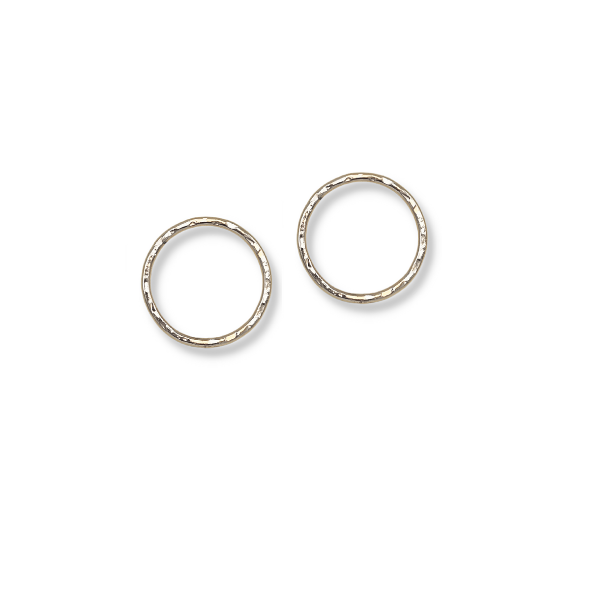 Two medium Rhodri Textured Circular Post Earrings from JAREDJAMIN Jewelry Online in 18K gold, with a lightly hammered finish, are placed parallel on a white background, casting soft shadows and separated by a small gap.