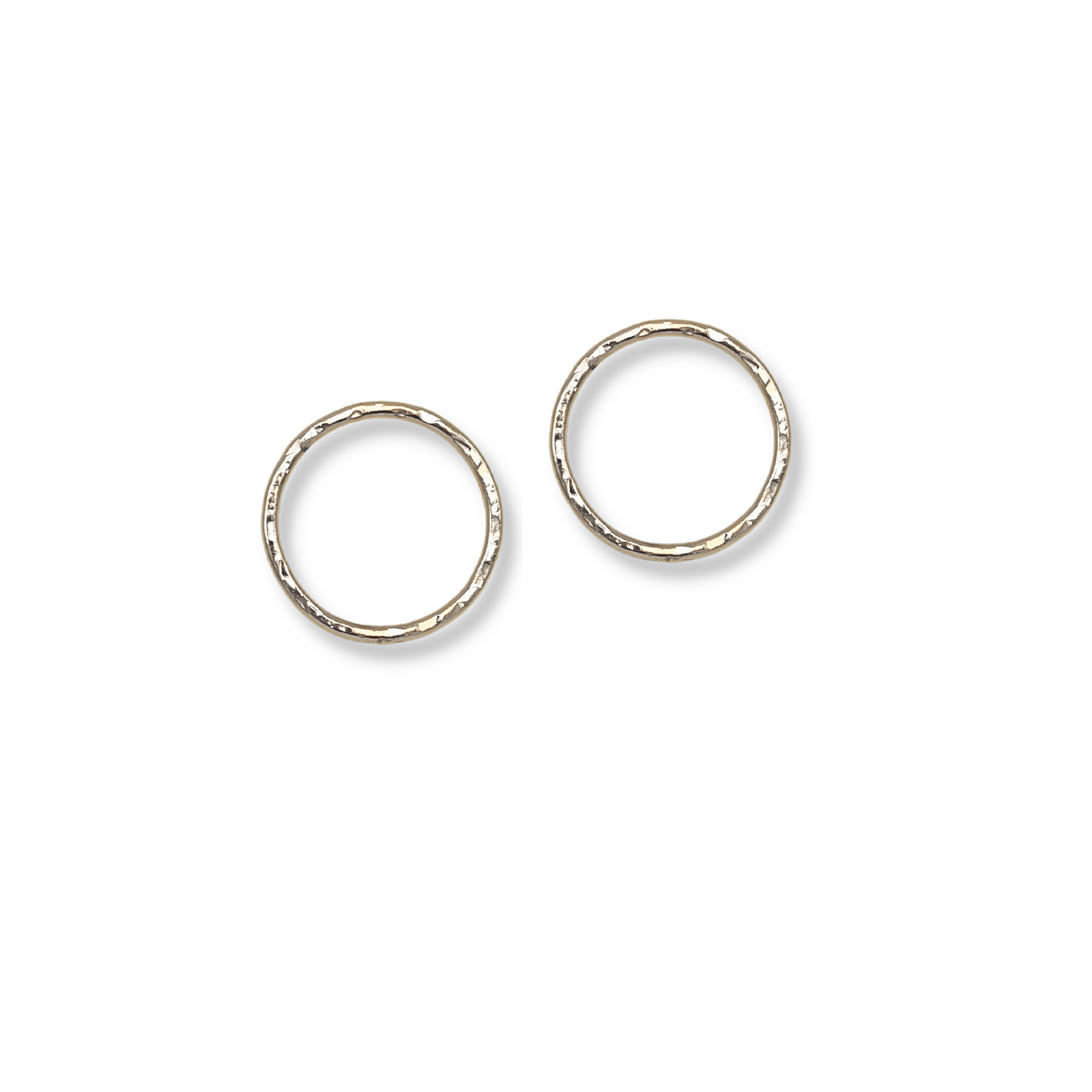 The Medium Rhodri Textured Circular Post Earrings by JAREDJAMIN Jewelry Online, crafted in 18K gold with a hammered finish, are displayed flat on a white background with soft shadows highlighting their handcrafted look.