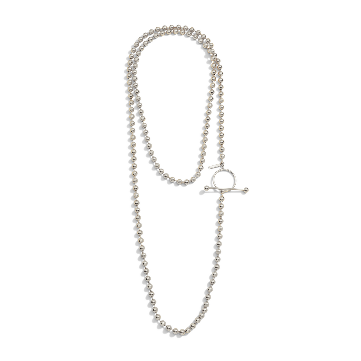 Los plata Constellation Orbita collar de JAREDJAMIN Joyería Online features reflective plata spheres y a toggle clasp con a circular aro y bar, laid flat en un gentle loop sobre un fondo blanco.