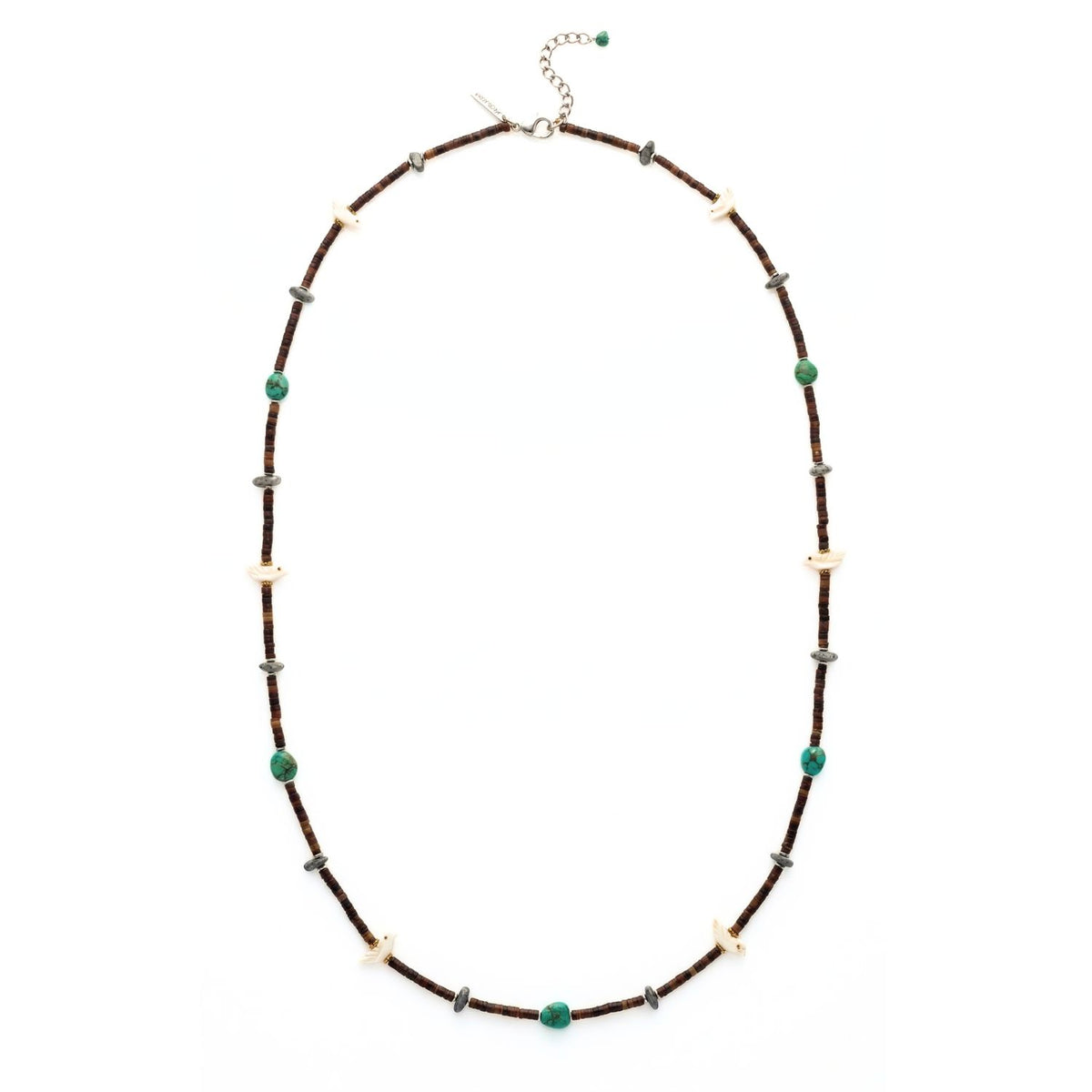 High-resolution studio product shot of the JAREDJAMIN Kai Necklace laid out in an oval configuration against a crisp white backdrop, showcasing the dark natural horn discs, turquoise pebbles, matte hematite stones, carved bird charms, and the sterling silver extension chain with clasp.