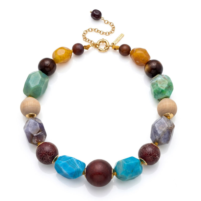 High-resolution studio product shot of the JAREDJAMIN Kiva Multi-Stone & Wood Hand-Knotted Statement Collar Necklace displayed flat in a loop against a white background, highlighting the faceted agate, wooden beads, 18k gold bead caps, and adjustable clasp.