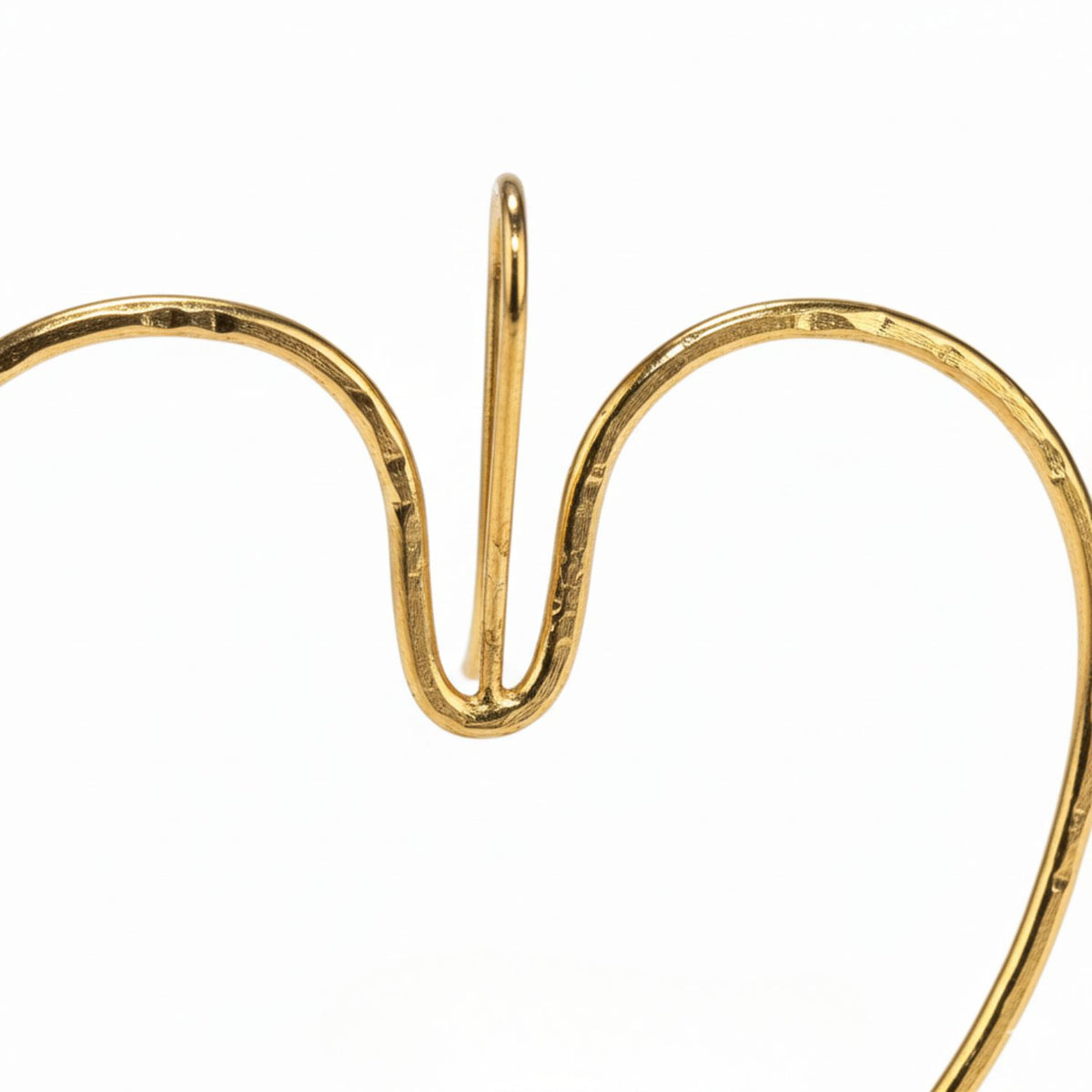 A close-up of JAREDJAMIN Jewelry Online’s Large Gold Fluttering Heart Hook Earrings, featuring smooth curves, a shiny 18K gold-plated finish, and a top loop, shown against a plain white background.