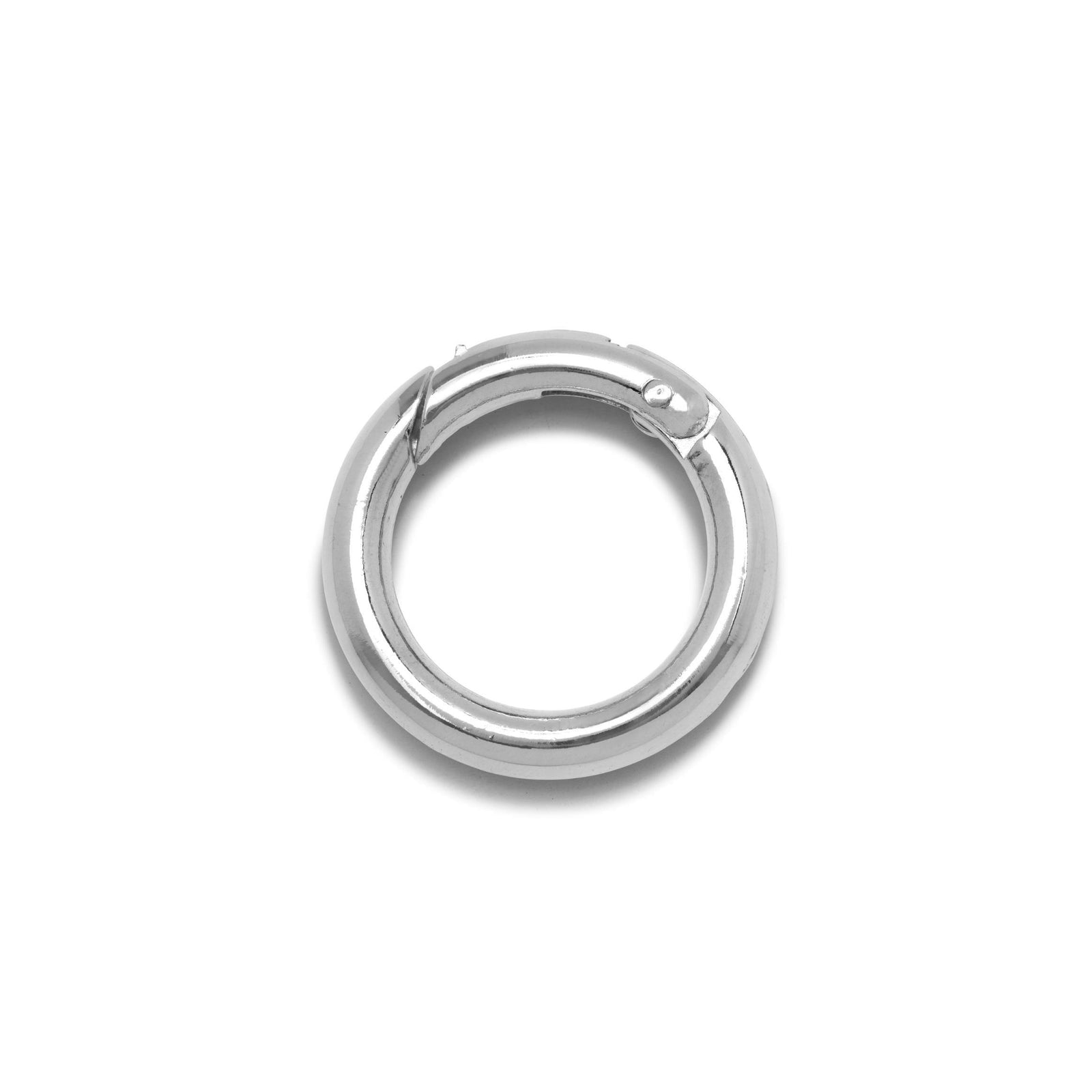 The JAREDJAMIN Jewelry Online Silver Large Circular Clicker Clasp earring, featuring a smooth, polished finish and secure silver-plated clasp, is displayed flat on a plain white background.
