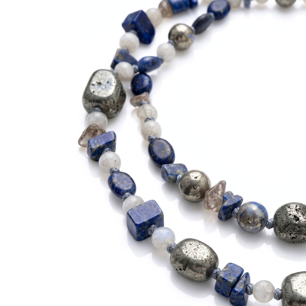 Lorelei Beaded Gemstone Necklace, macro detail of the gemstone necklace's lapis, moonstone and pyrite beads.