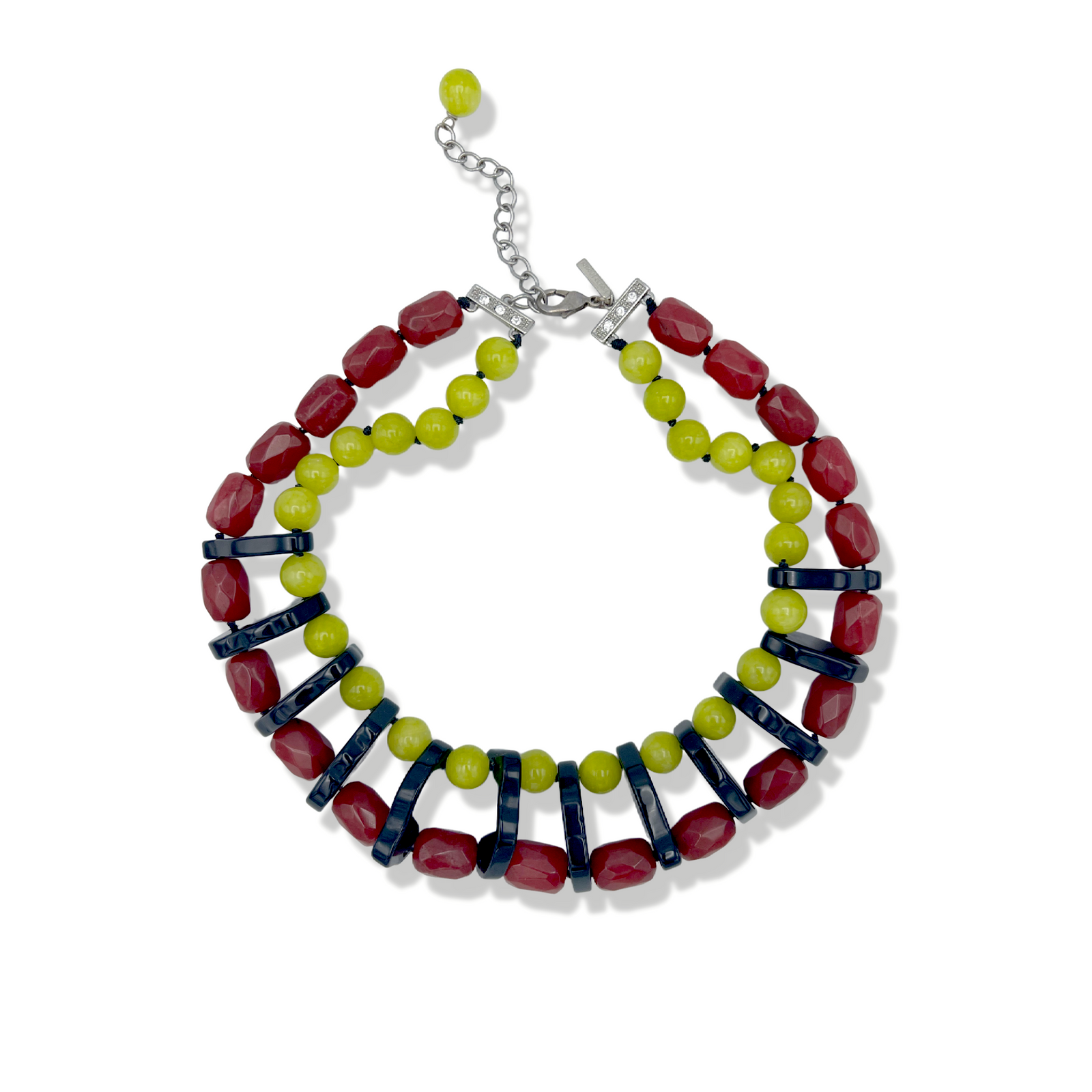 The Modern Mix Gemstone Necklace by JAREDJAMIN Jewelry Online features chunky two-strand styling with lime-green and red faceted beads, dark blue spacers, a sterling silver lobster clasp, and an adjustable chain finished with a green bead.