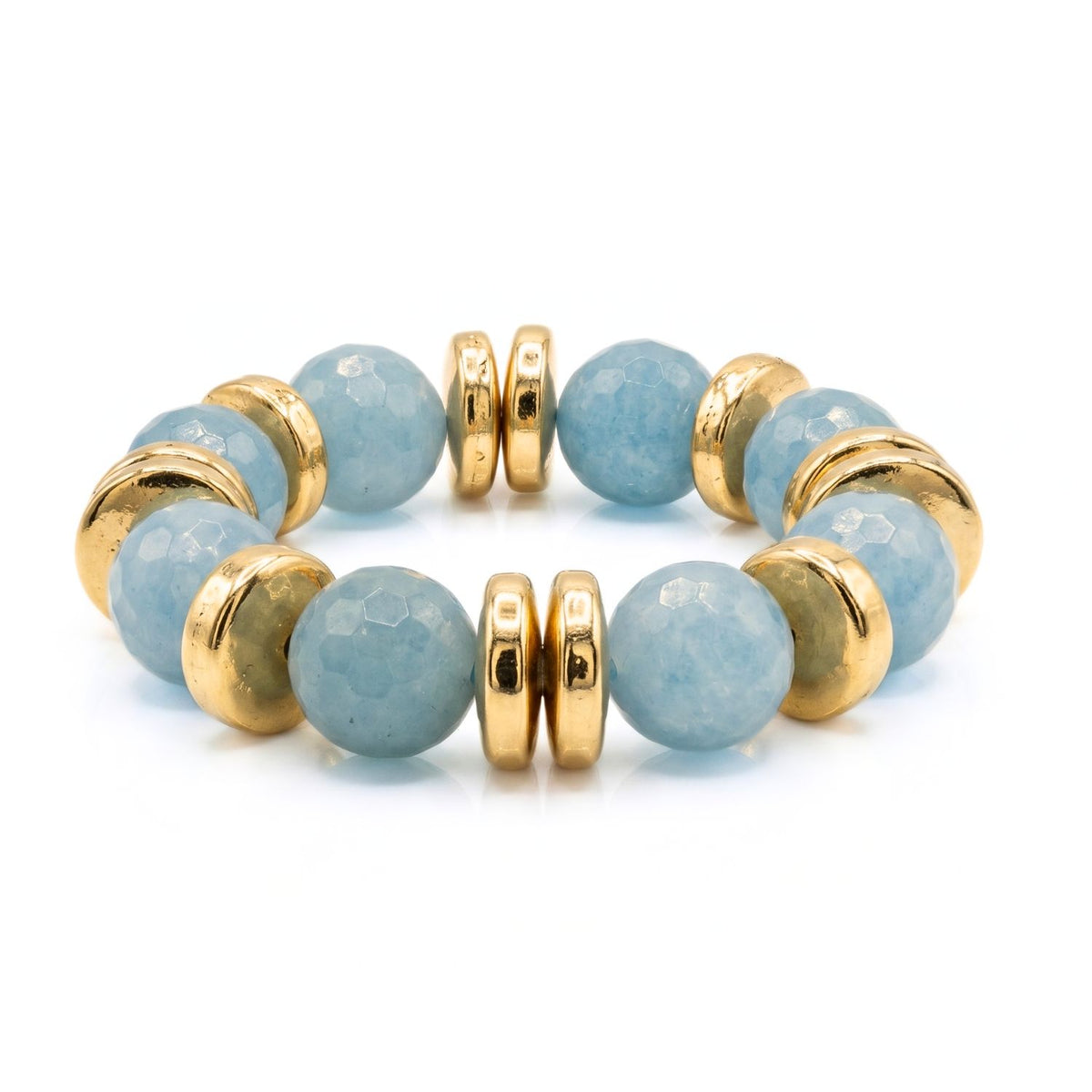 High-resolution studio product shot of the JAREDJAMIN Olivia stretch bracelet variant featuring large 16mm faceted sky-blue aquamarine round gemstones and high-polish 18k gold-plated disc accent beads.