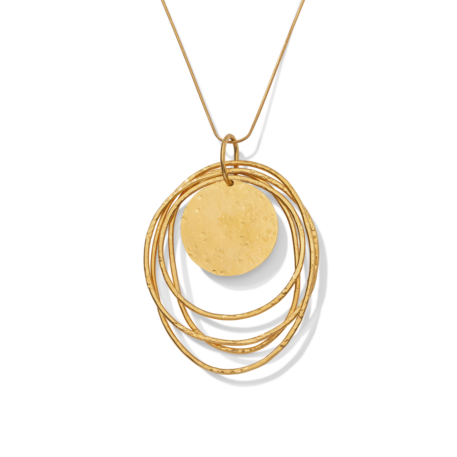 The Peacock Dawn Gold Pendant Chain Necklace by JAREDJAMIN Jewelry Online features overlapping textured 18k gold plated hoops and a central hammered disc inspired by peacock tail feathers, shown on a white background to highlight its intricate, shiny design.