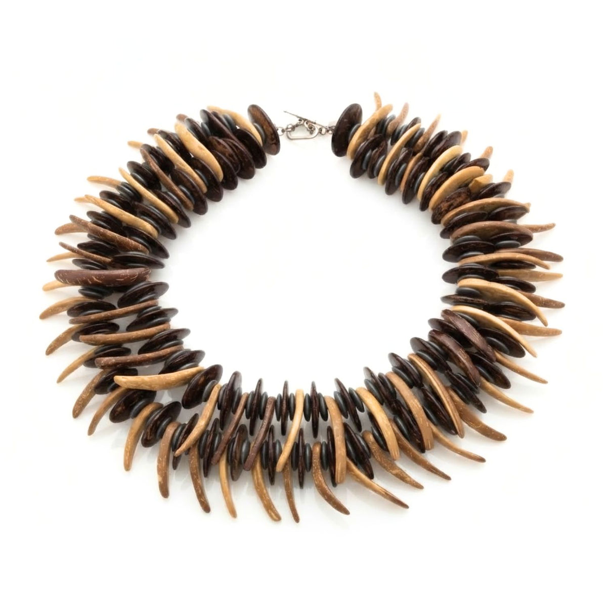 Studio product shot of the Pergola Perfection double-strand organic necklace displayed flat in a full loop against a white background, showing the dual-strand structure, lobster clasp, and patterned sequence of coconut and spike wood beads.