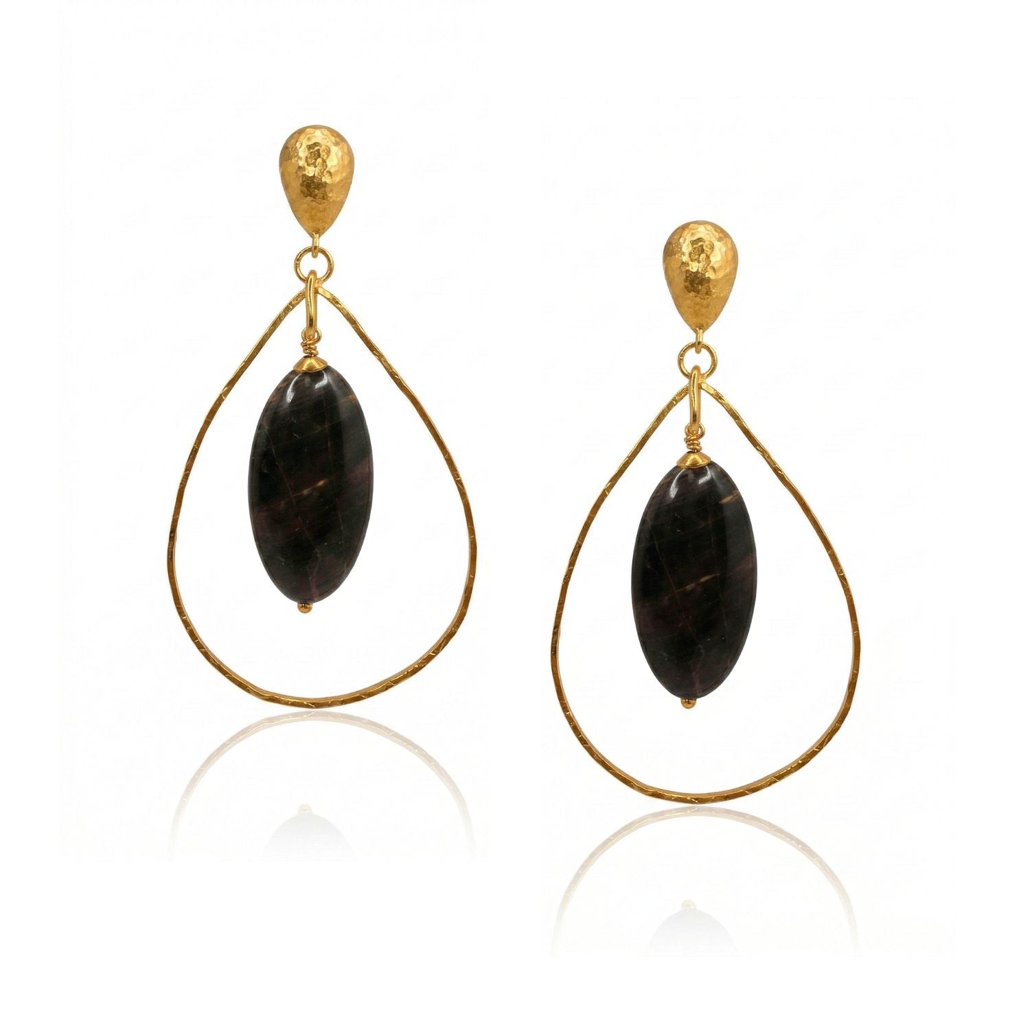 The JAREDJAMIN Petra Jasper Earrings feature gold-tone drop statement hoops with textured gold studs and large oval black stones at the center, shown against a plain white background.