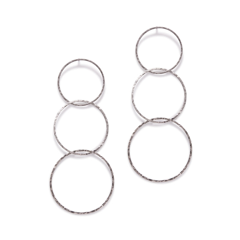 Silver Lindy Links Post Earrings by JAREDJAMIN Jewelry Online: never-tarnish e-coated silver plated earrings with three textured, vertically interconnected hoops from smallest to largest, shown on a plain white background.