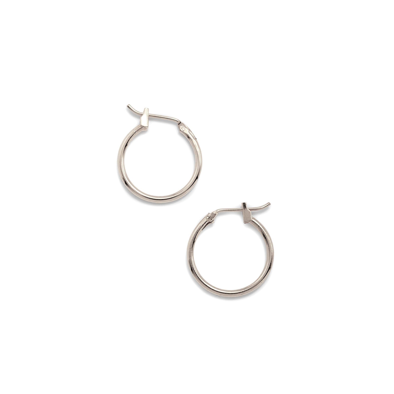 Two Silver Kahlo Hoop Click-Top Earrings xs by JAREDJAMIN Jewelry Online are shown on a white background—one earring lies flat with the latch closed, while the other highlights its click-top closure mechanism.