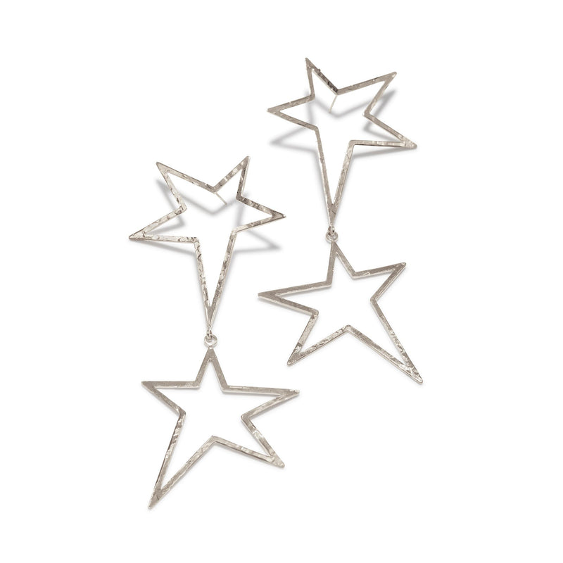 The Silver Shooting Star Dust Dangle Post Earrings by JAREDJAMIN Jewelry Online feature two open star outlines in a vertical line with a hammered finish, adding modern geometric flair to their shiny silver look.