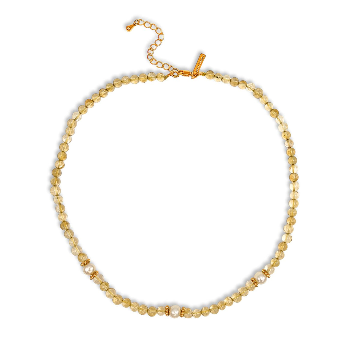 The Sand Bar Sensation Citrine Necklace by JAREDJAMIN Jewelry Online features round, translucent yellow-gold citrine beads separated by metallic gold spacers with rhinestone accents and an adjustable gold chain clasp with a rectangular tag.
