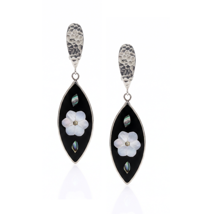 High-resolution studio product shot of the pair of Esperanza Upcycled Inlaid Earrings displayed against a white background, highlighting their black onyx marquise shape, central mother-of-pearl flower, and hammered clip tops.
