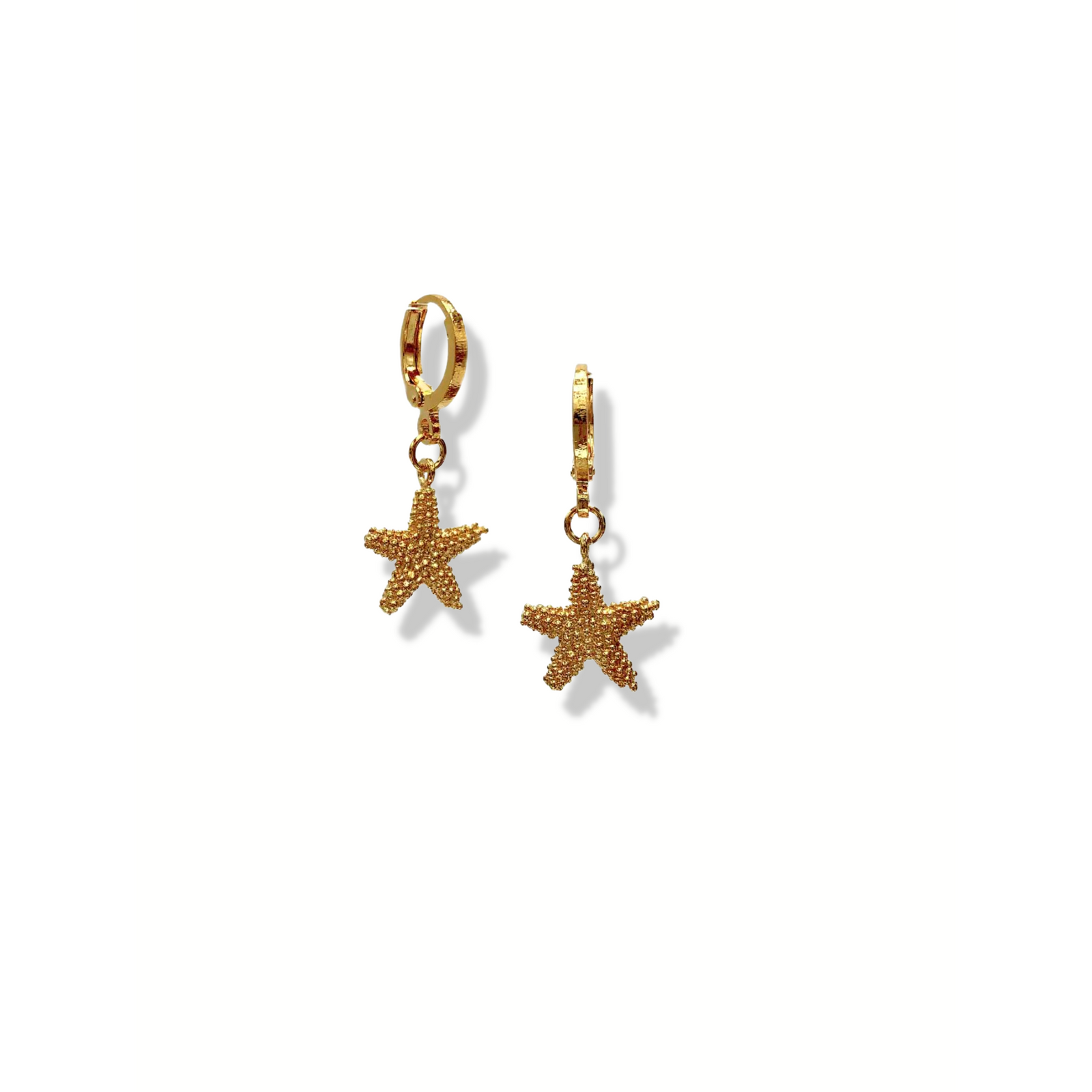 The Sea Star Leverback Earrings by JAREDJAMIN Jewelry Online feature gold hoops with nautical starfish charms. Beaded details cast subtle shadows on a white background, and one hoop appears slightly open while both hang vertically.