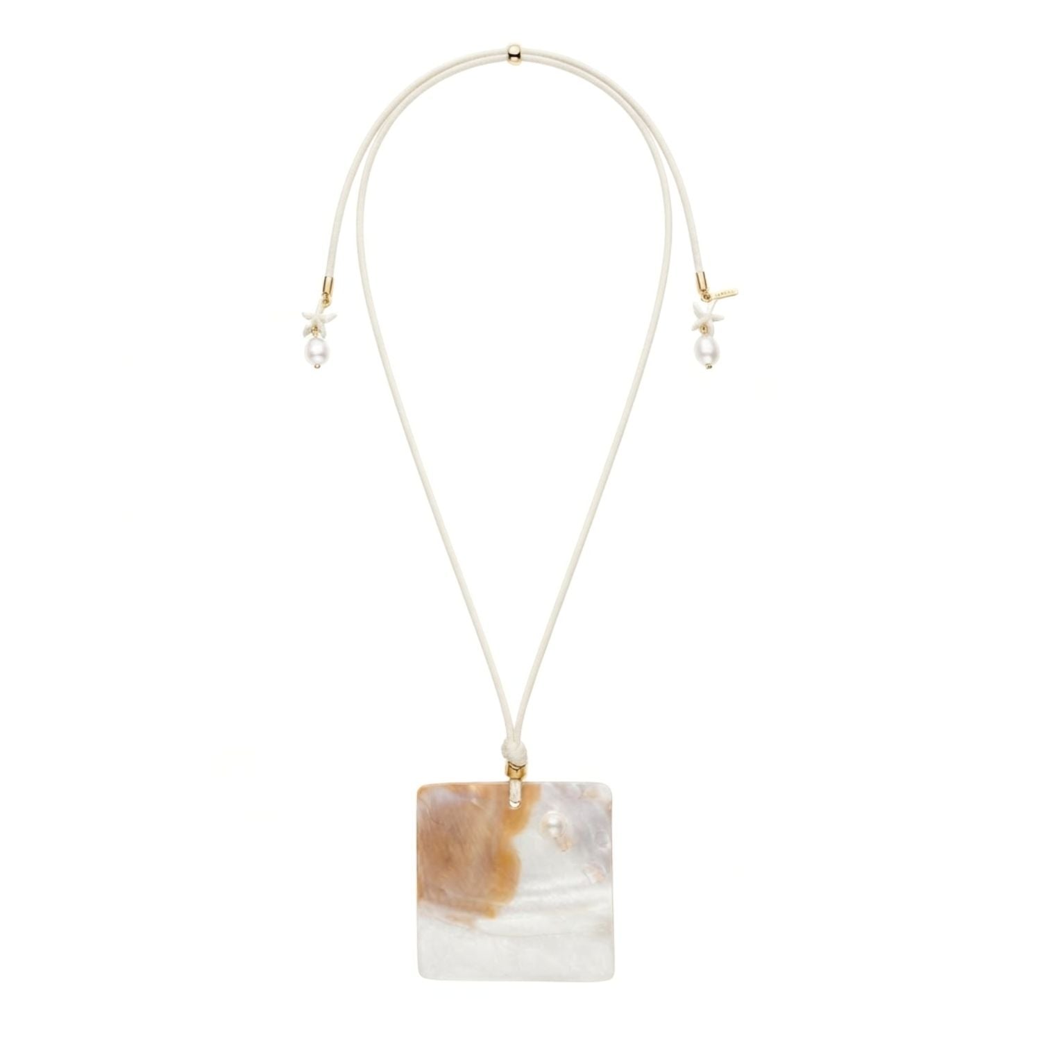 High-resolution studio product shot of the JAREDJAMIN Maris Adjustable Shell Pendant Cord Necklace on a white backdrop, showcasing the natural square shell plaque, white cordage, and pearl star tassels.