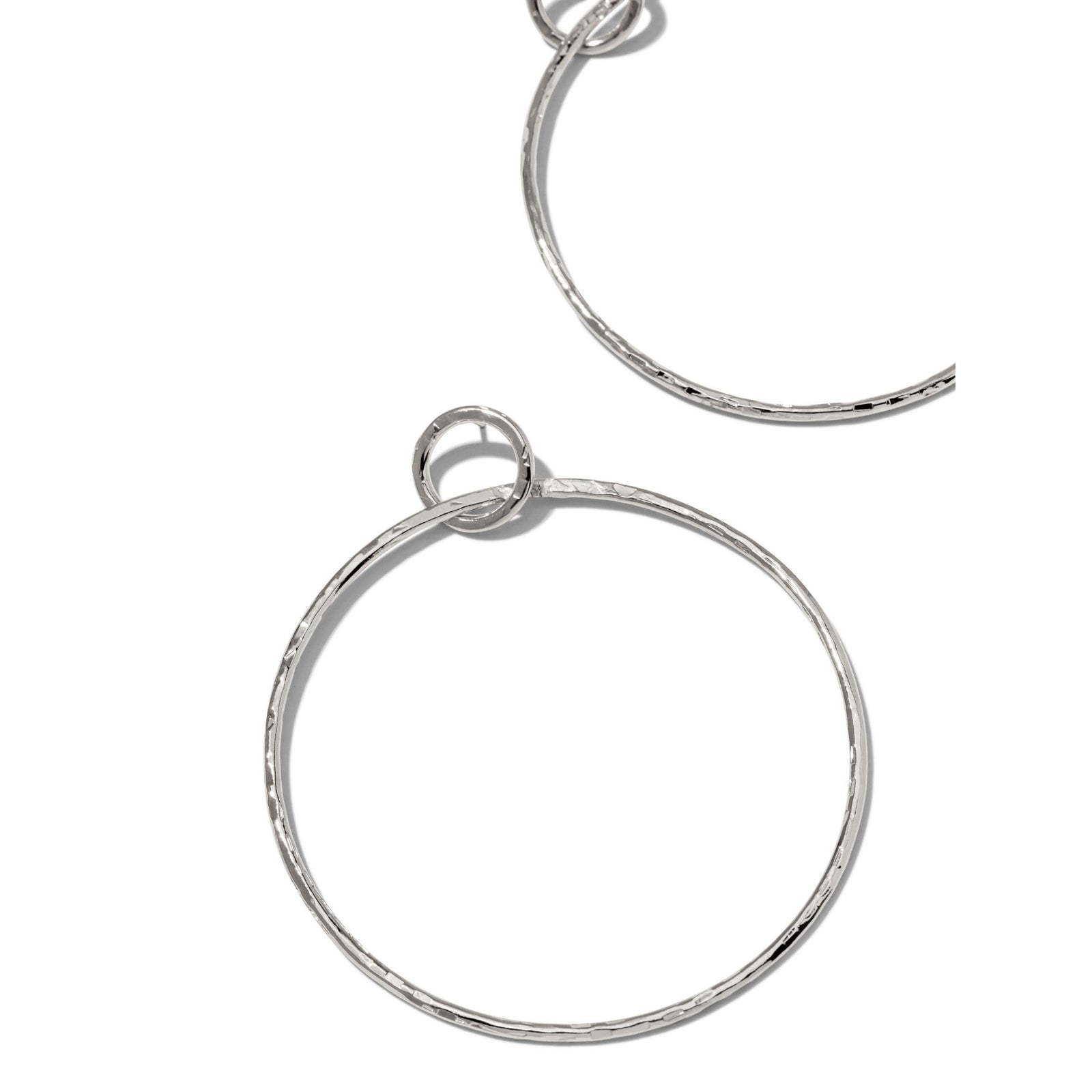 The Silver Ellen Textured Hoop Post Earrings by JAREDJAMIN Jewelry Online are shown on a white background, featuring minimalist silver hoops with a small loop at the top for elegant, fashionable appeal.