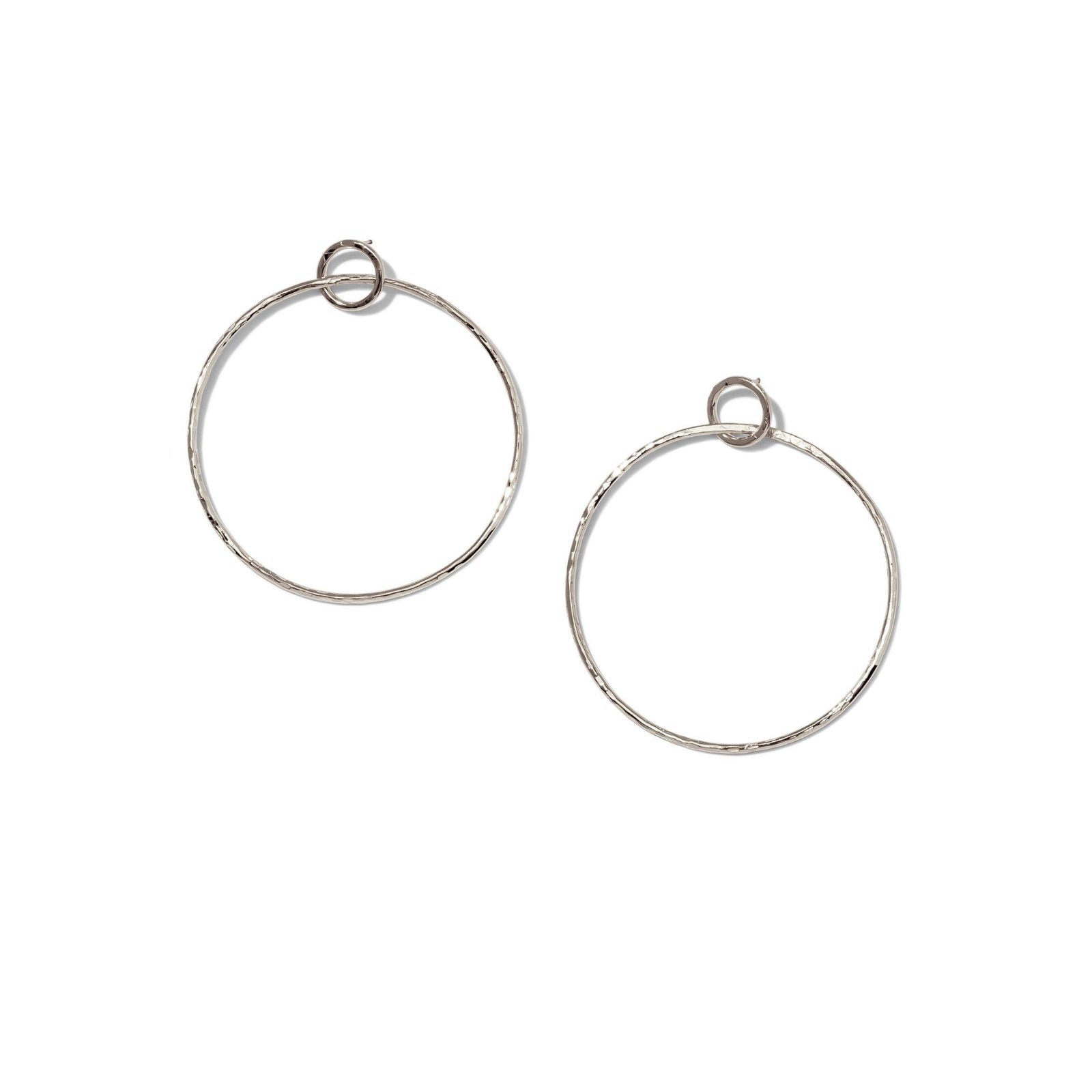 The Silver Ellen Textured Hoop Post Earrings by JAREDJAMIN Jewelry Online are shown on a white background, featuring minimalist silver hoops with a small loop at the top for elegant, fashionable appeal.