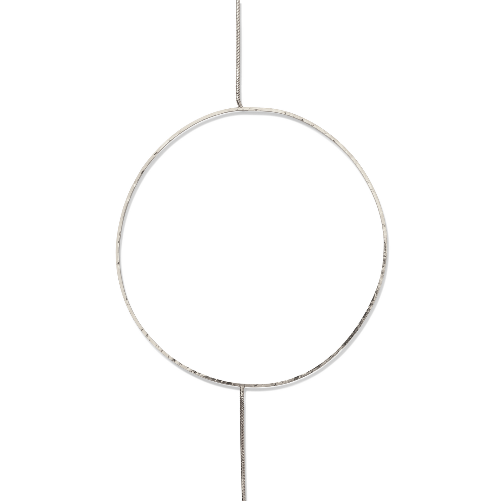 The JAREDJAMIN Jewelry Online Silver Halo Necklace features a long, thin silver-tone chain with a large circular pendant on one side and a toggle clasp, creating an asymmetrical minimalist look against a plain white background.