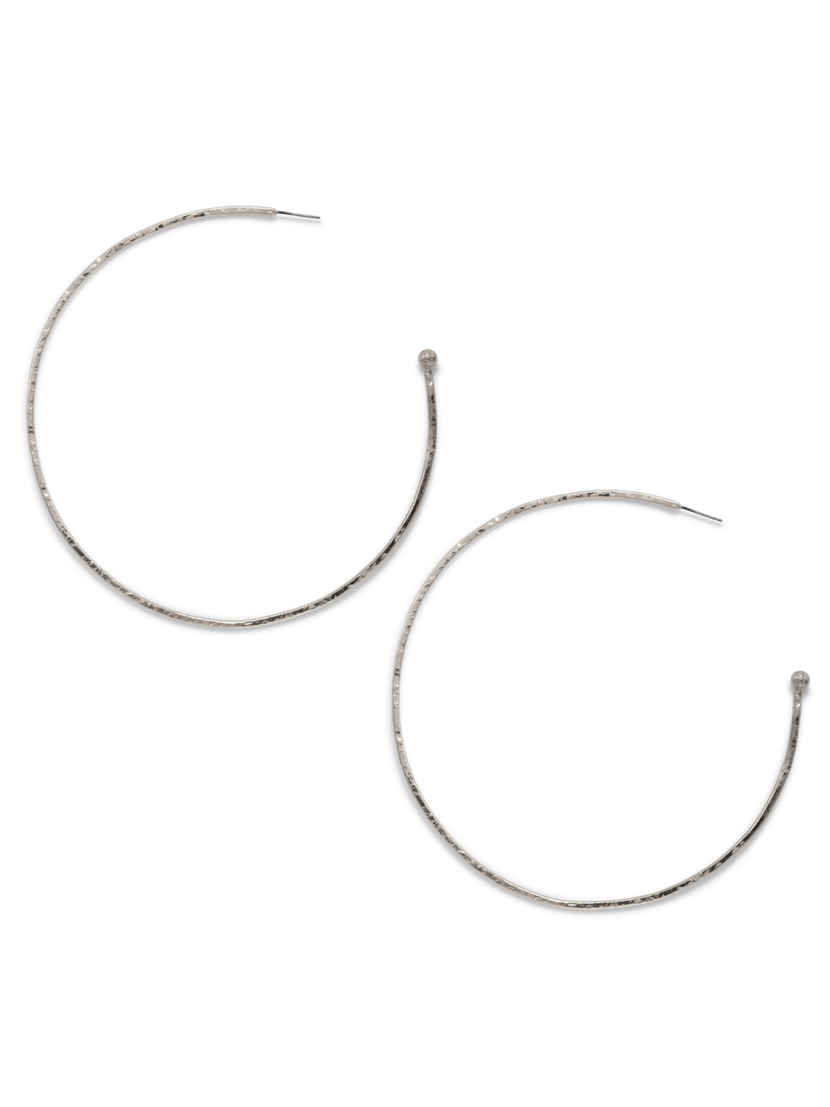 Discover JAREDJAMIN Jewelry Online&#39;s Silver Large Hooptastic Hoop Post Earrings: large, thin silver hoops with a hammered texture and open-ended design featuring a metal ball and straight post. These elegant earrings are displayed side by side on a pristine white background.