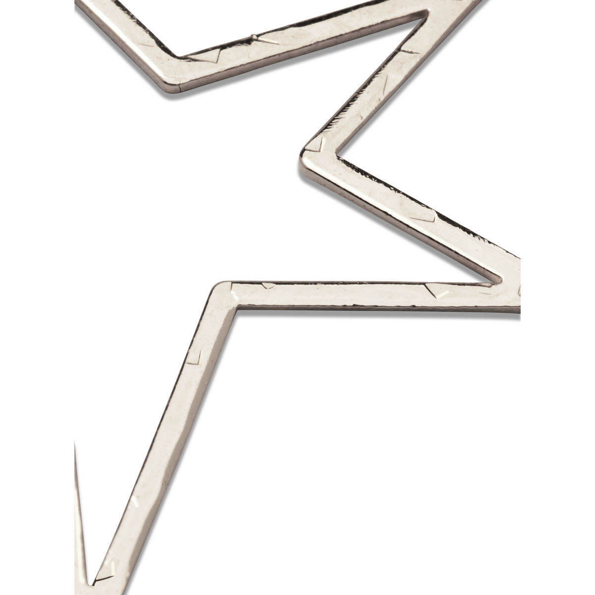 Un primer plano of the JAREDJAMIN Joyería Online plata Large Shooting Star colgante dije shows its metallic, angular star outline con three sharp points, reflective surface, y minor imperfections against a fondo blanco.