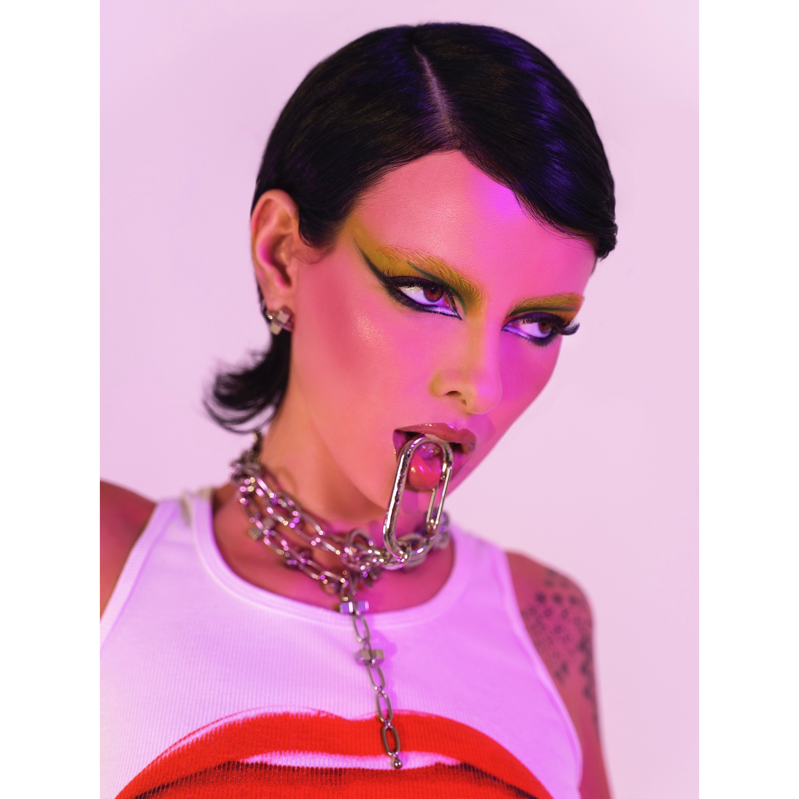 The Silver Medium Oval Carabiner Clicker Clasp by JAREDJAMIN Jewelry Online features a shiny, reflective silver finish and spring-loaded gate, perfect for chain link jewelry or as a secure clasp for link chains.