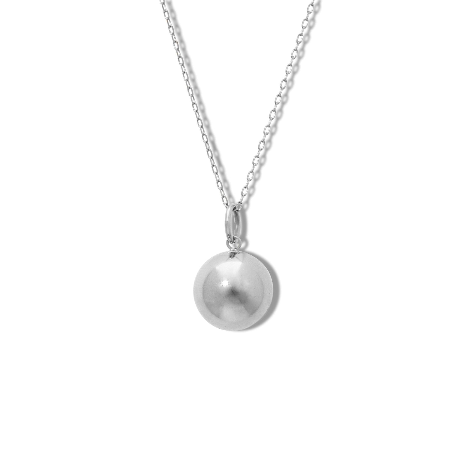 The JAREDJAMIN Jewelry Online Silver Orbita Smooth Ball Necklace Pendant Charm features a shiny, round smooth silver pendant with a subtle reflective finish on a thin chain, centered against a plain white background and attached by a small loop.