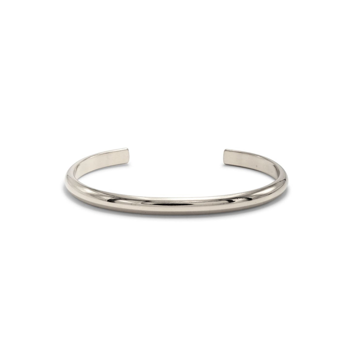 The Silver Parker Cuff captures light with its stainless gleam and sculpted, open silhouette—hand-assembled in our West Hollywood studio from eco-conscious materials in limited runs. Style Note: punctuates sharp tailoring or softened evening knits with ease.