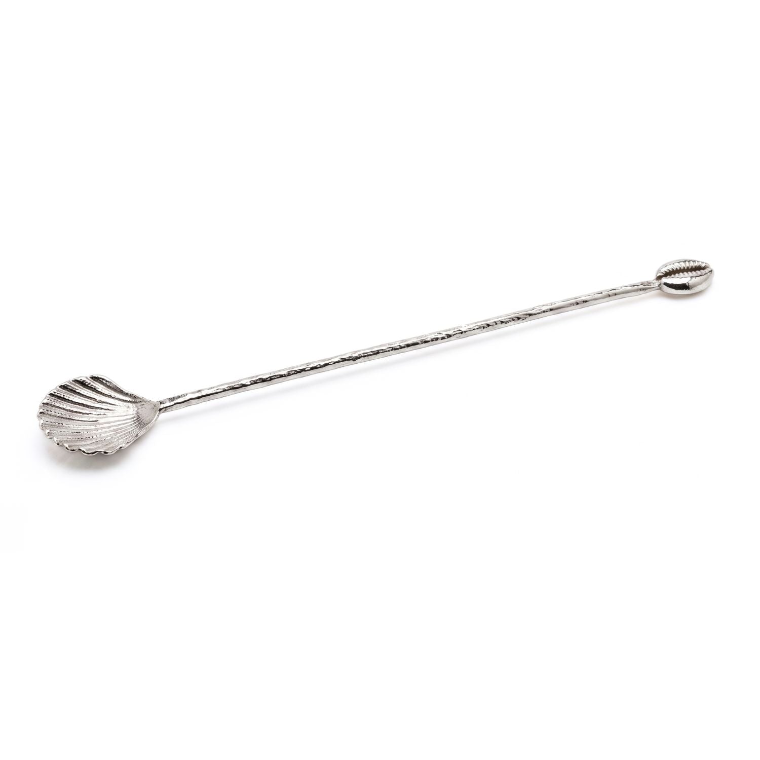 Minimalist studio layout of the JAREDJAMIN Silver Prickly Cockle & Cowrie Cocktail Stirrer, showcasing the detailed silver-plated textures of the fan-shaped cockle spoon basin and the sleek cowrie crown at opposite ends of the slim rod.