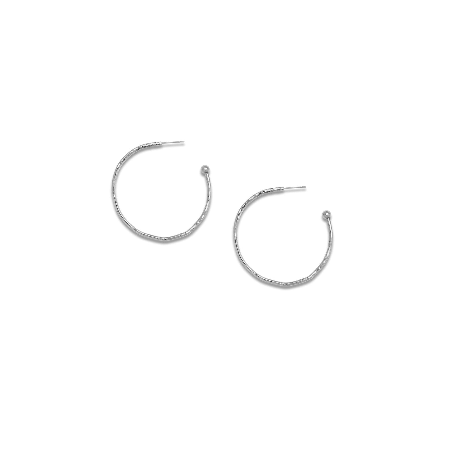 The Silver Small Hooptastic Hoop Post Earrings by JAREDJAMIN Jewelry Online are thin, textured silver hoops with round ends, finished in elegant White Rhodium. Their open, minimalist design is displayed on a white background.